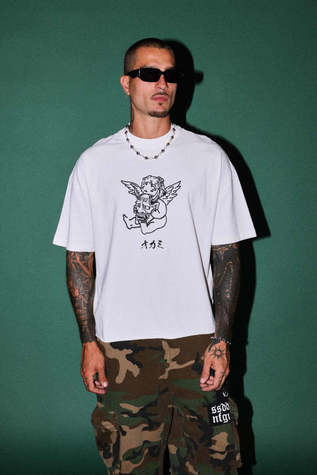 Oni Cherub Distressed Grunge Mid Length Raw Hem Tee in Cream