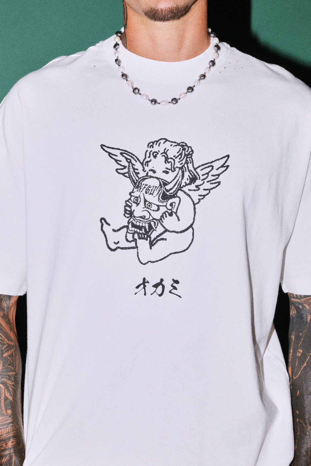 Oni Cherub Distressed Grunge Mid Length Raw Hem Tee in Cream