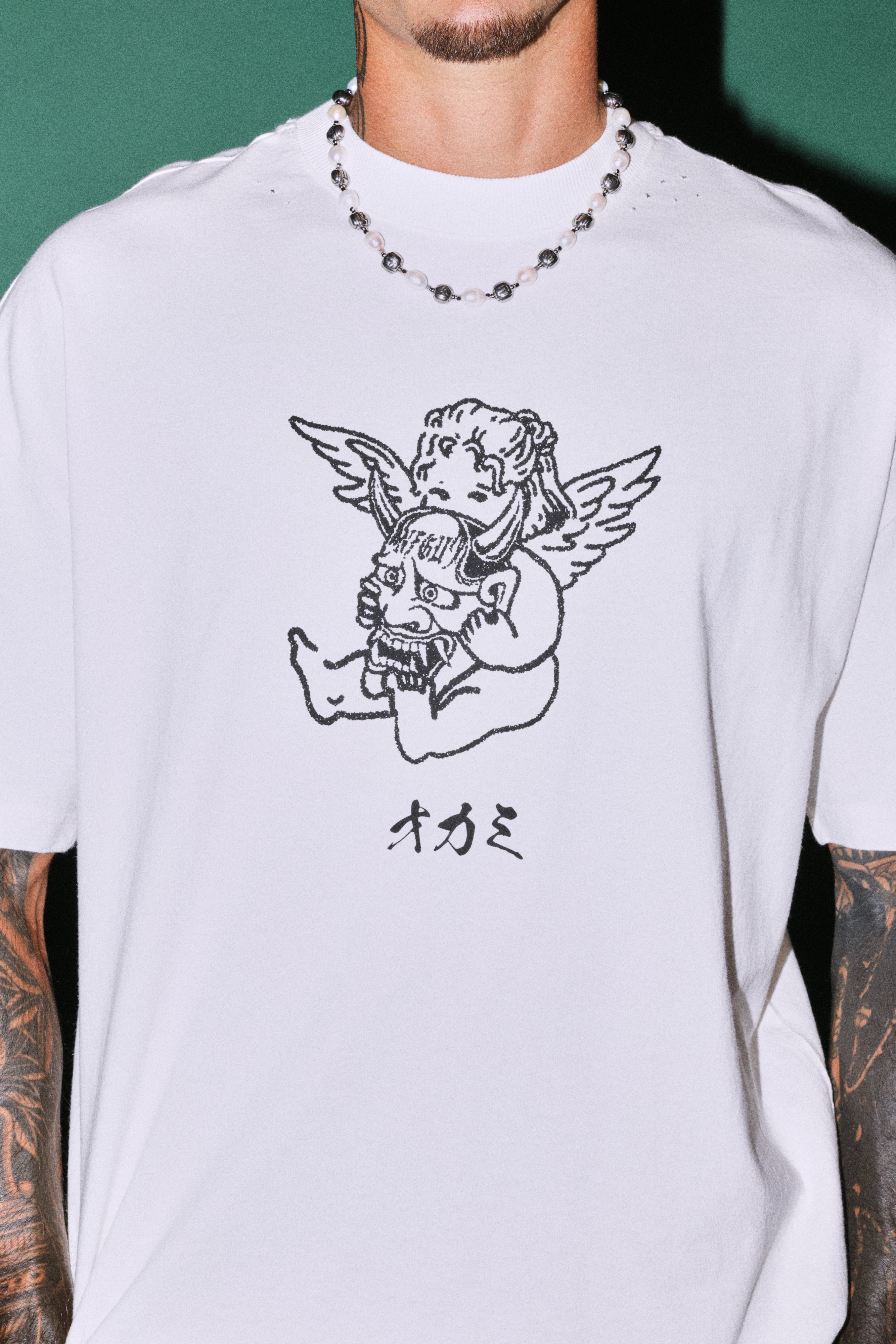 Oni Cherub Distressed Grunge Mid Length Raw Hem Tee in Cream