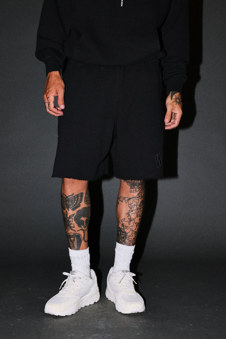 Loyalty Frvr Raw Hem Oversized Post Lounge Sweat Shorts in Black