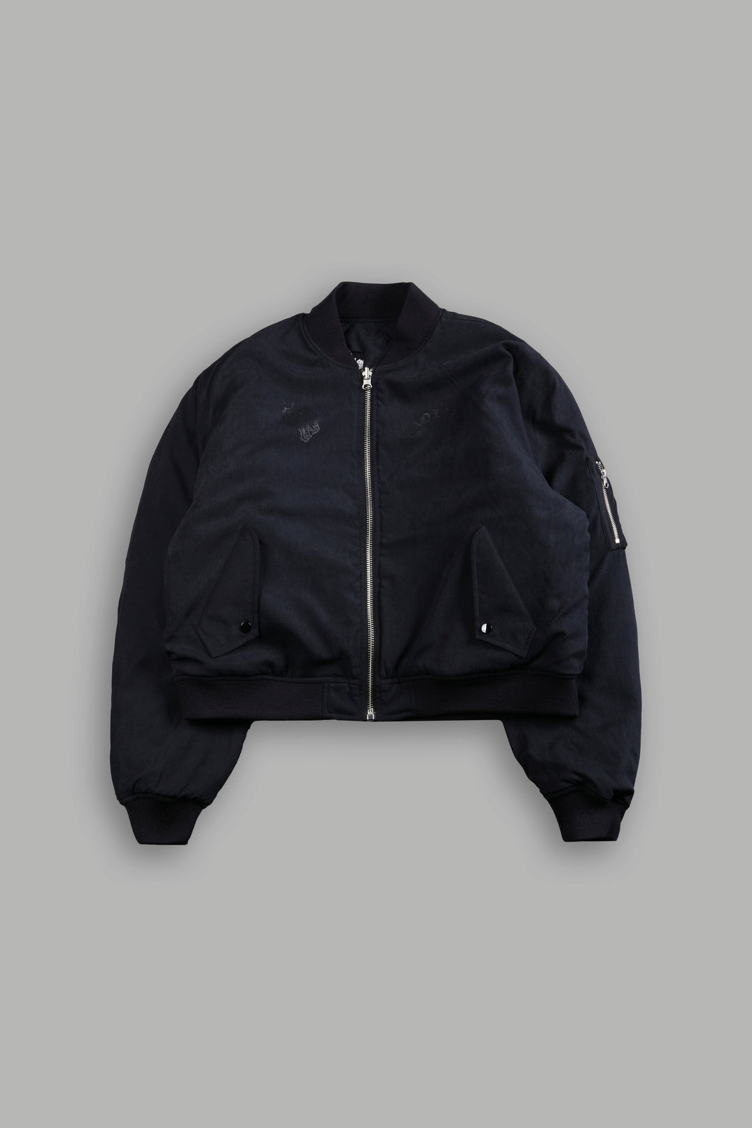 Patched Wolf Hesh Cloud Quilted Reversible Bomber Jacket in Black
