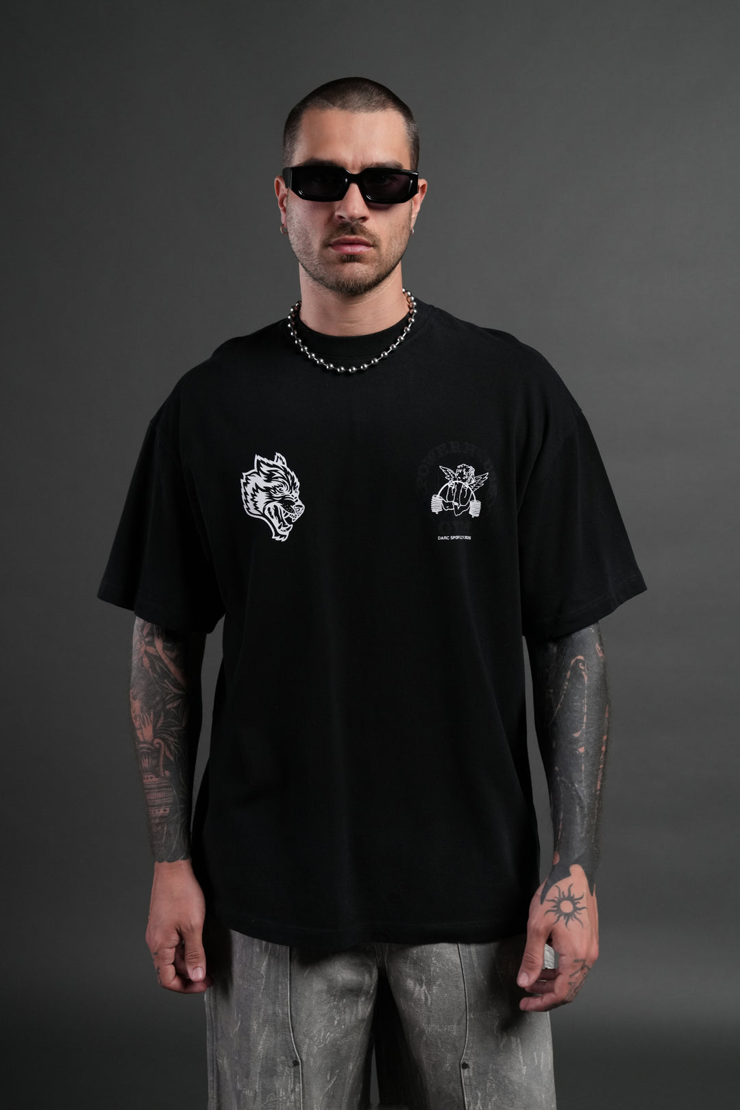 Powerhouse of the Cherub Unisex Premium Oversized Tee in Black Drift Wash