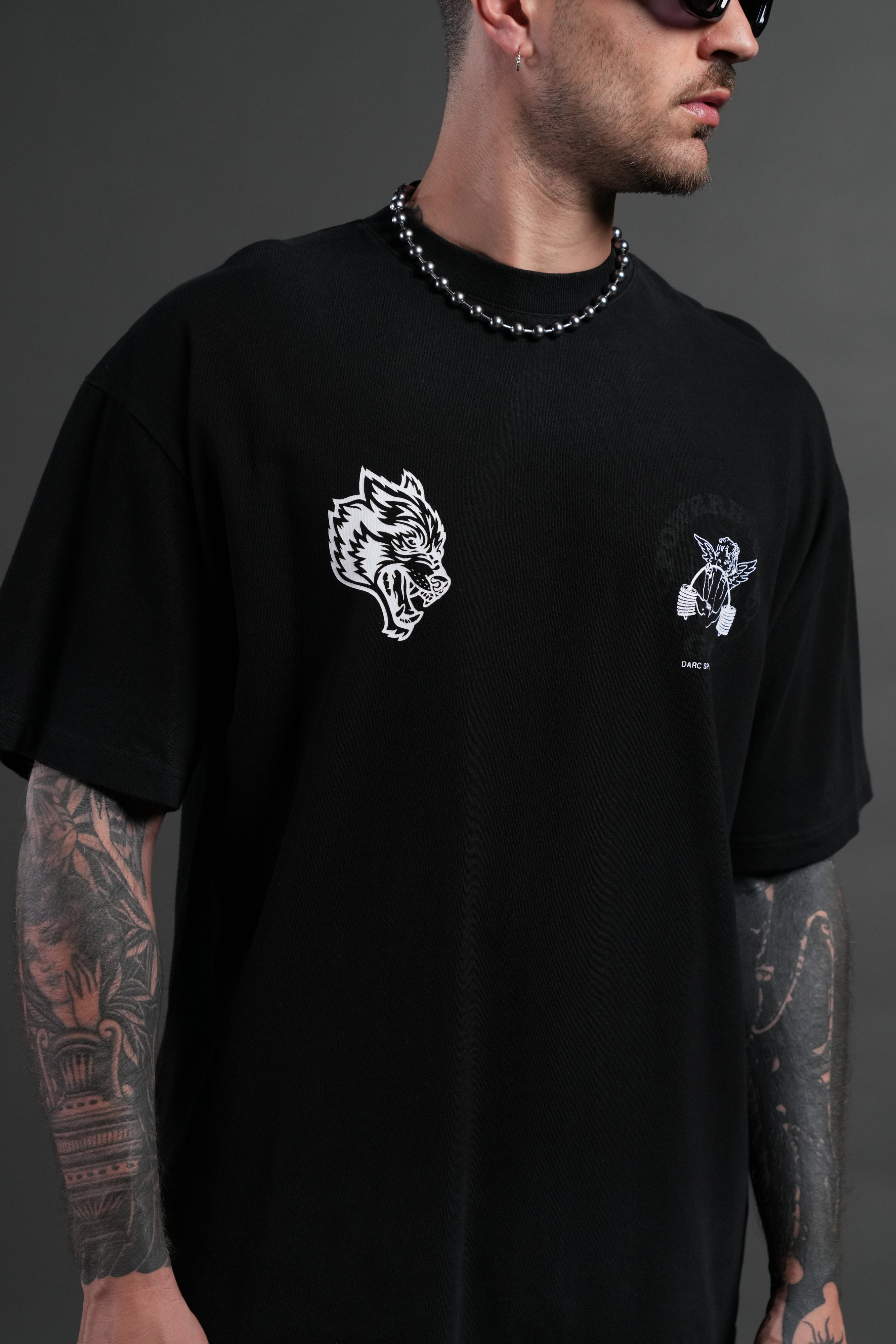 Powerhouse of the Cherub Unisex Premium Oversized Tee in Black Drift Wash