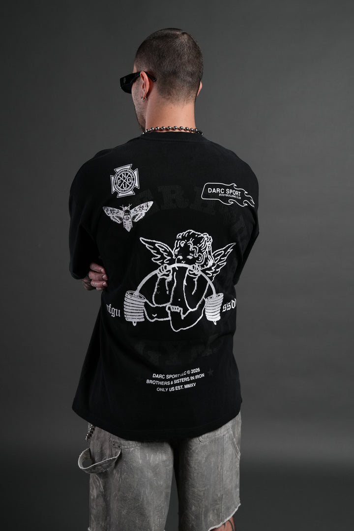 Powerhouse of the Cherub Unisex Premium Oversized Tee in Black Drift Wash