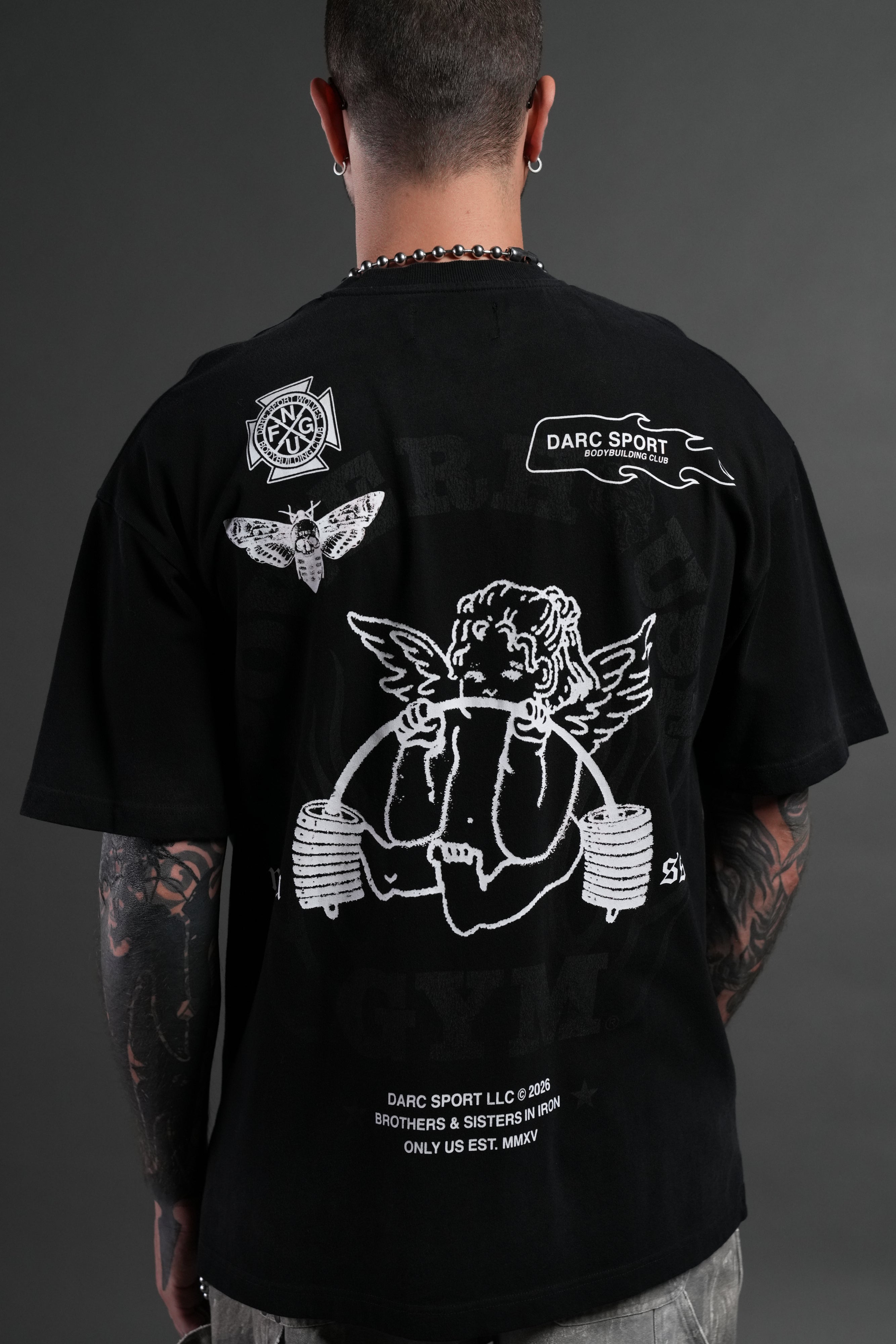 Powerhouse of the Cherub Unisex Premium Oversized Tee in Black Drift Wash