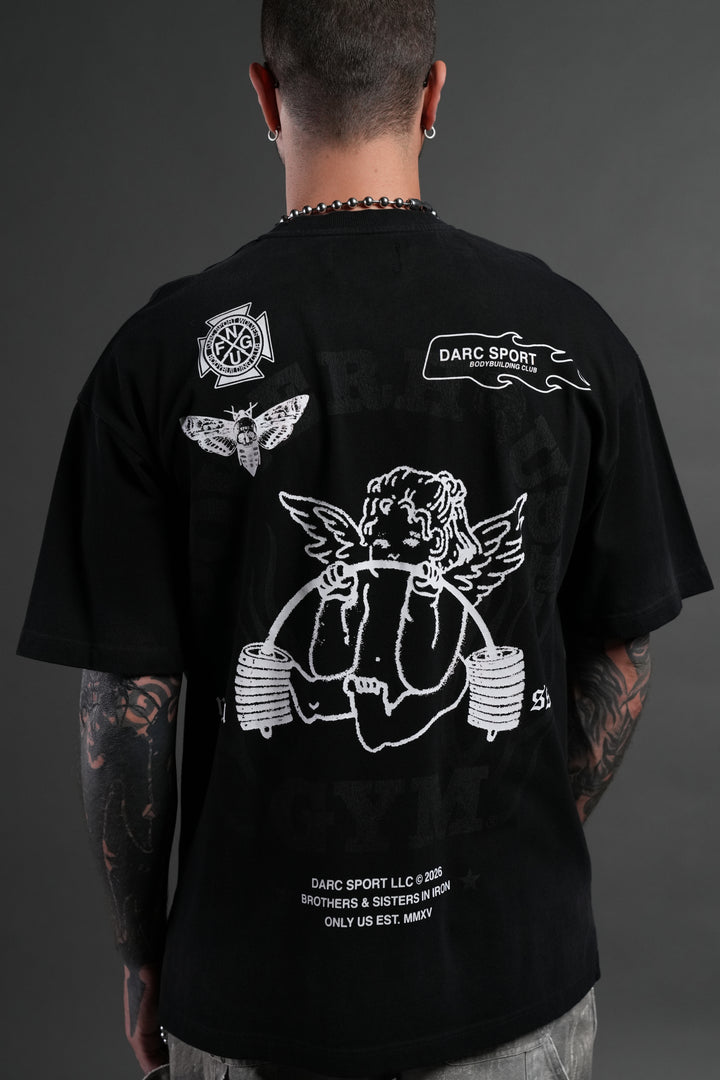 Powerhouse of the Cherub Unisex Premium Oversized Tee in Black Drift Wash