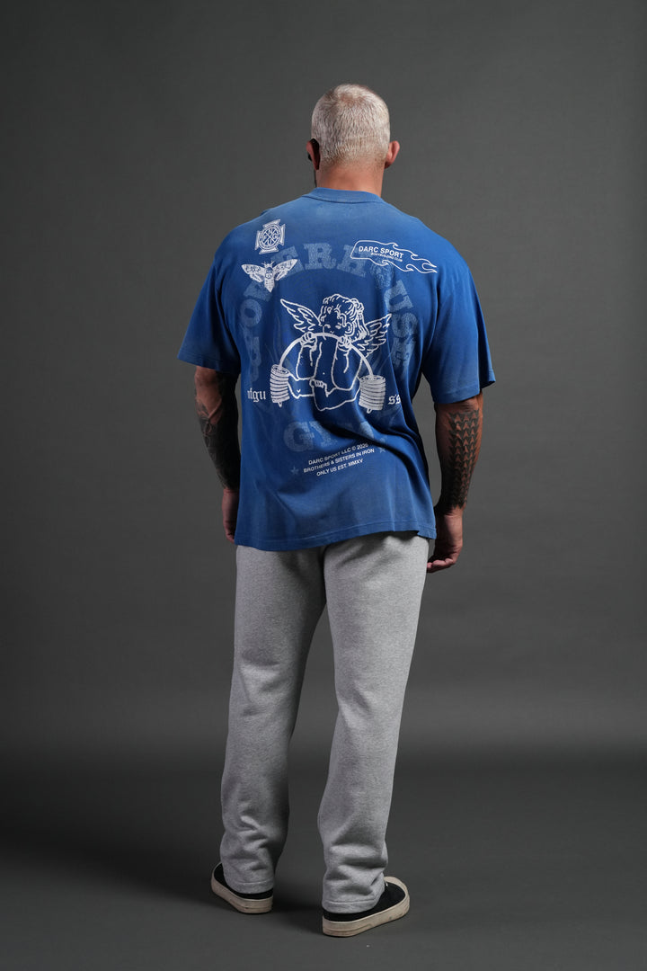 Powerhouse of the Cherub Unisex Premium Oversized Tee in Darc Cobalt Drift Wash