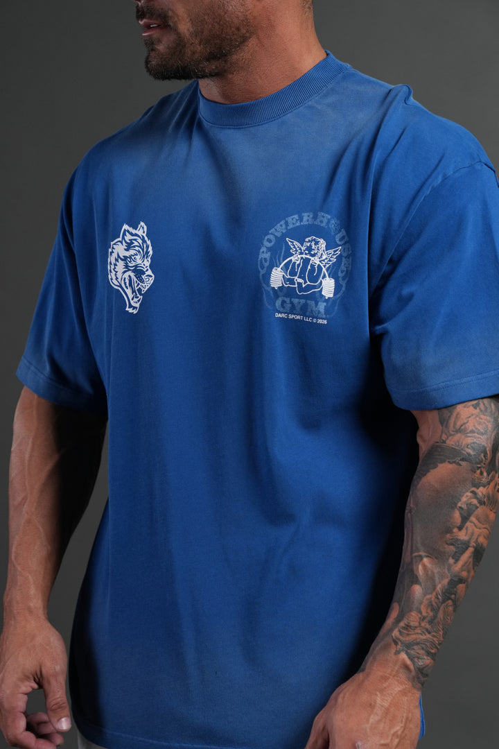 Powerhouse of the Cherub Unisex Premium Oversized Tee in Darc Cobalt Drift Wash