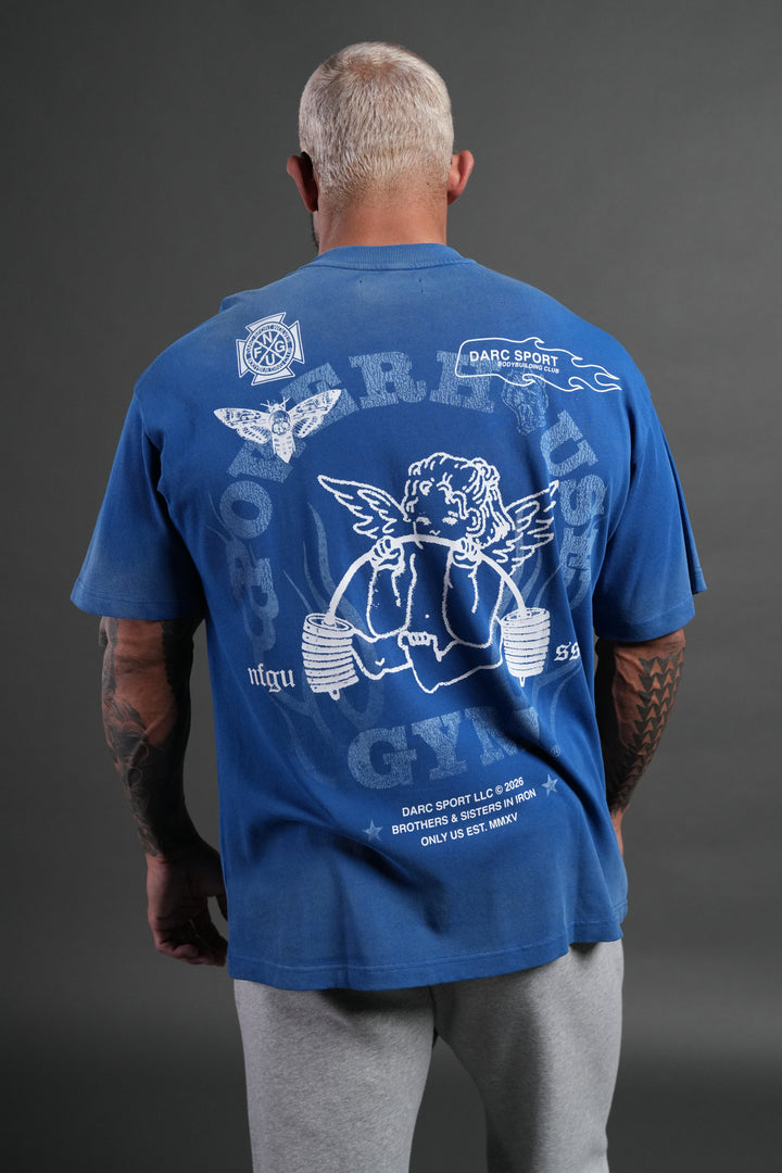 Powerhouse of the Cherub Unisex Premium Oversized Tee in Darc Cobalt Drift Wash