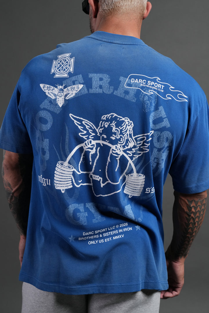 Powerhouse of the Cherub Unisex Premium Oversized Tee in Darc Cobalt Drift Wash
