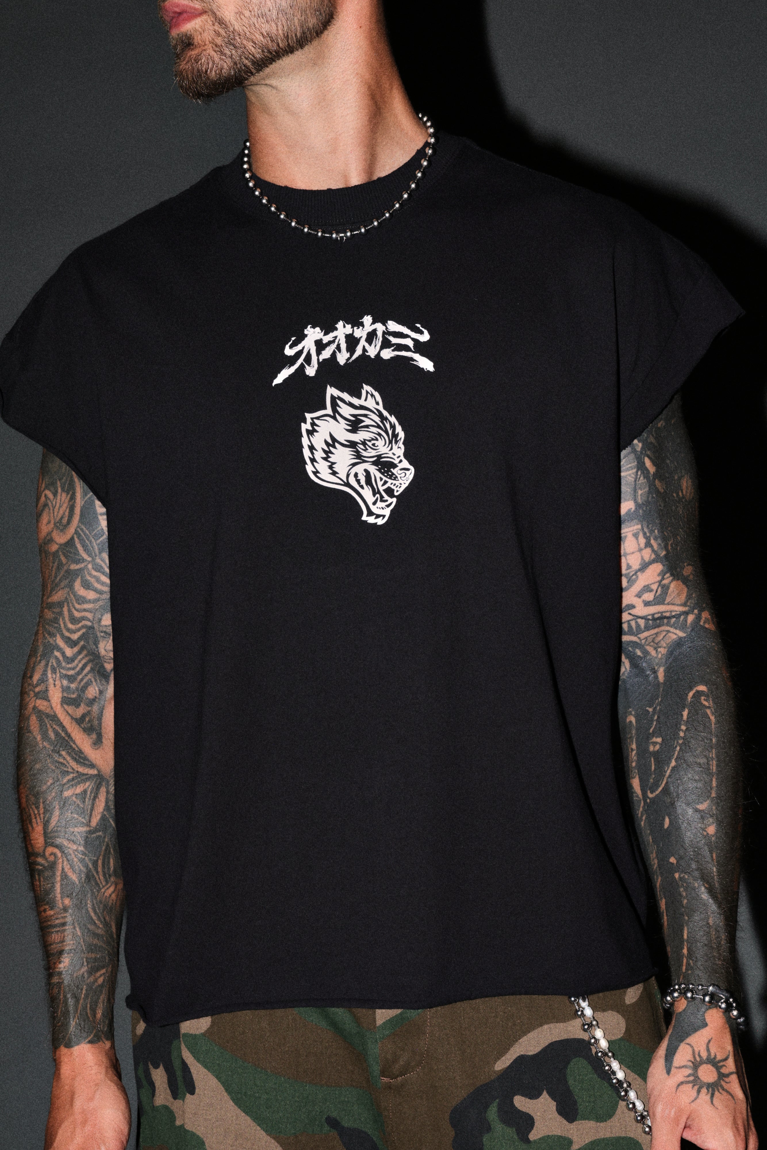 Our Code Distressed Grunge Cut Off Mid Length Raw Hem Tee in Black