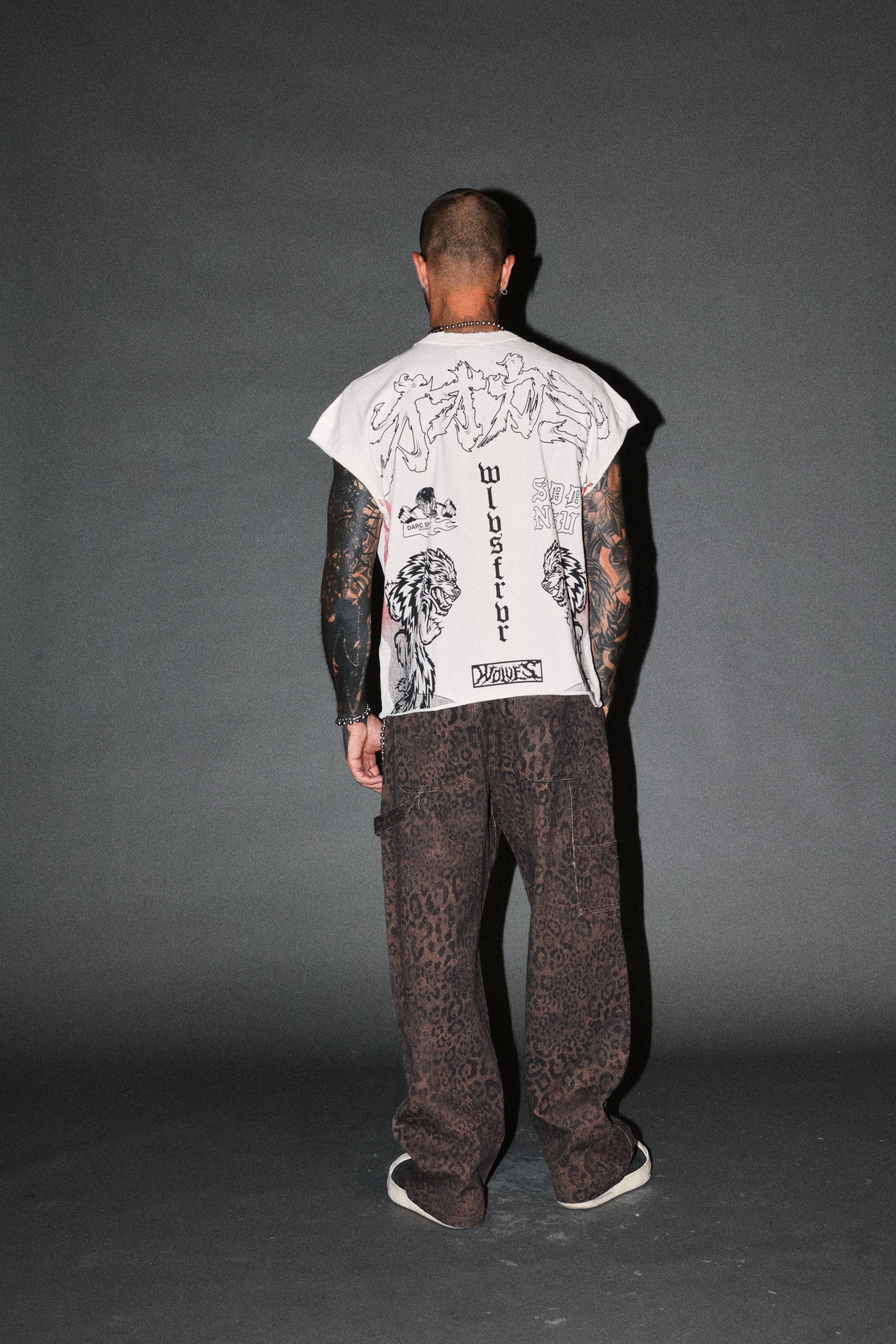 Our Code Distressed Grunge Cut Off Mid Length Raw Hem Tee in Cream