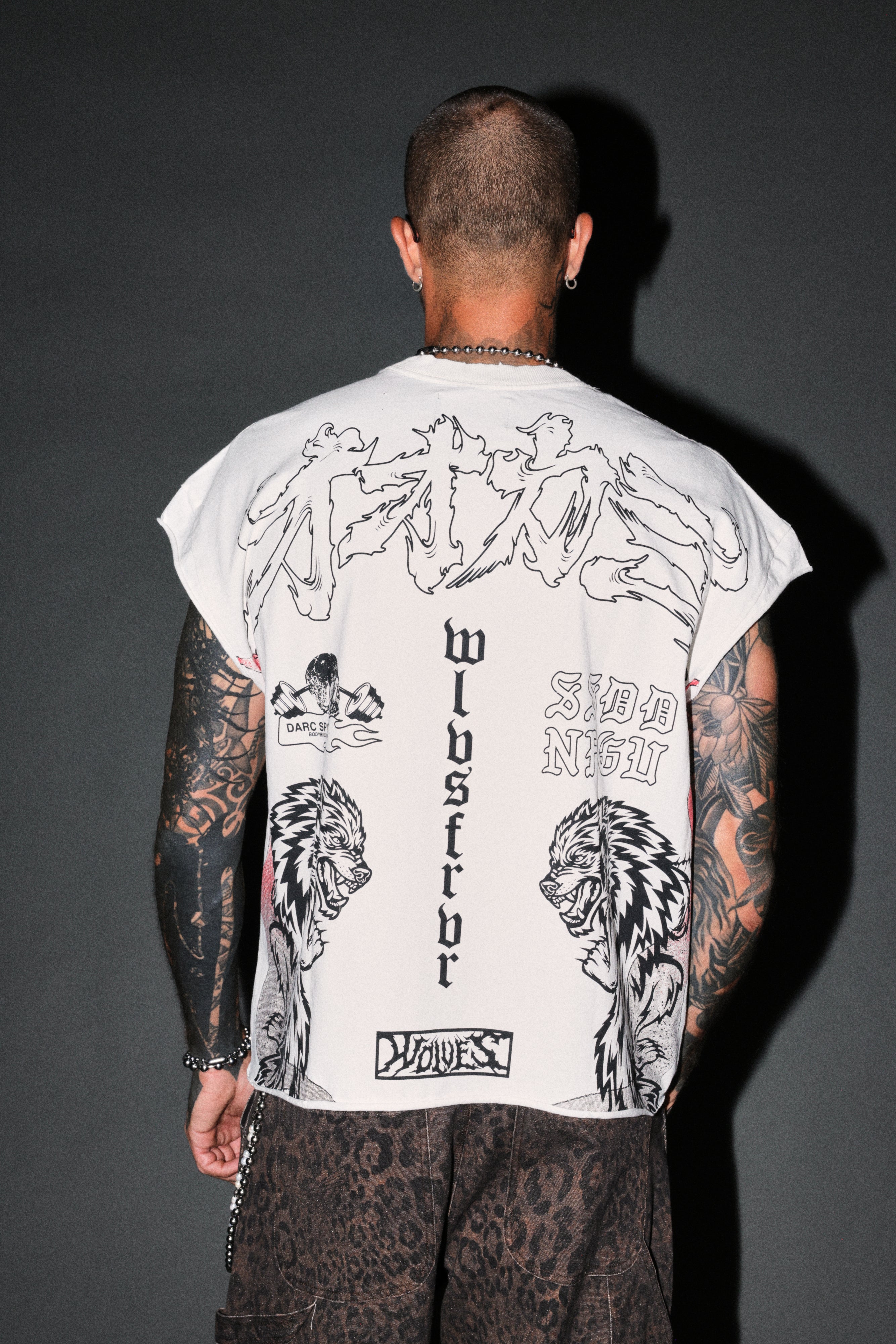 Our Code Distressed Grunge Cut Off Mid Length Raw Hem Tee in Cream