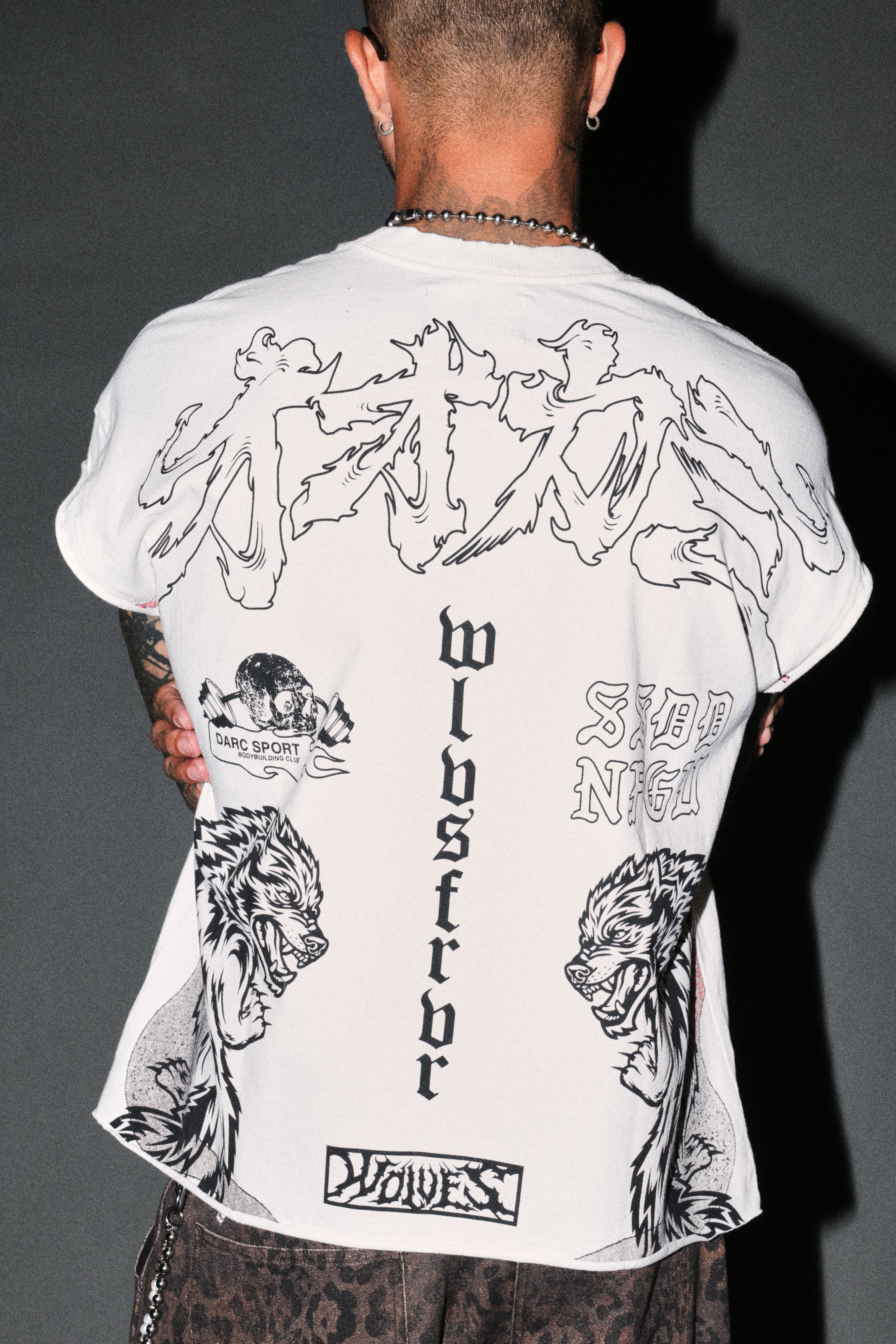 Our Code Distressed Grunge Cut Off Mid Length Raw Hem Tee in Cream