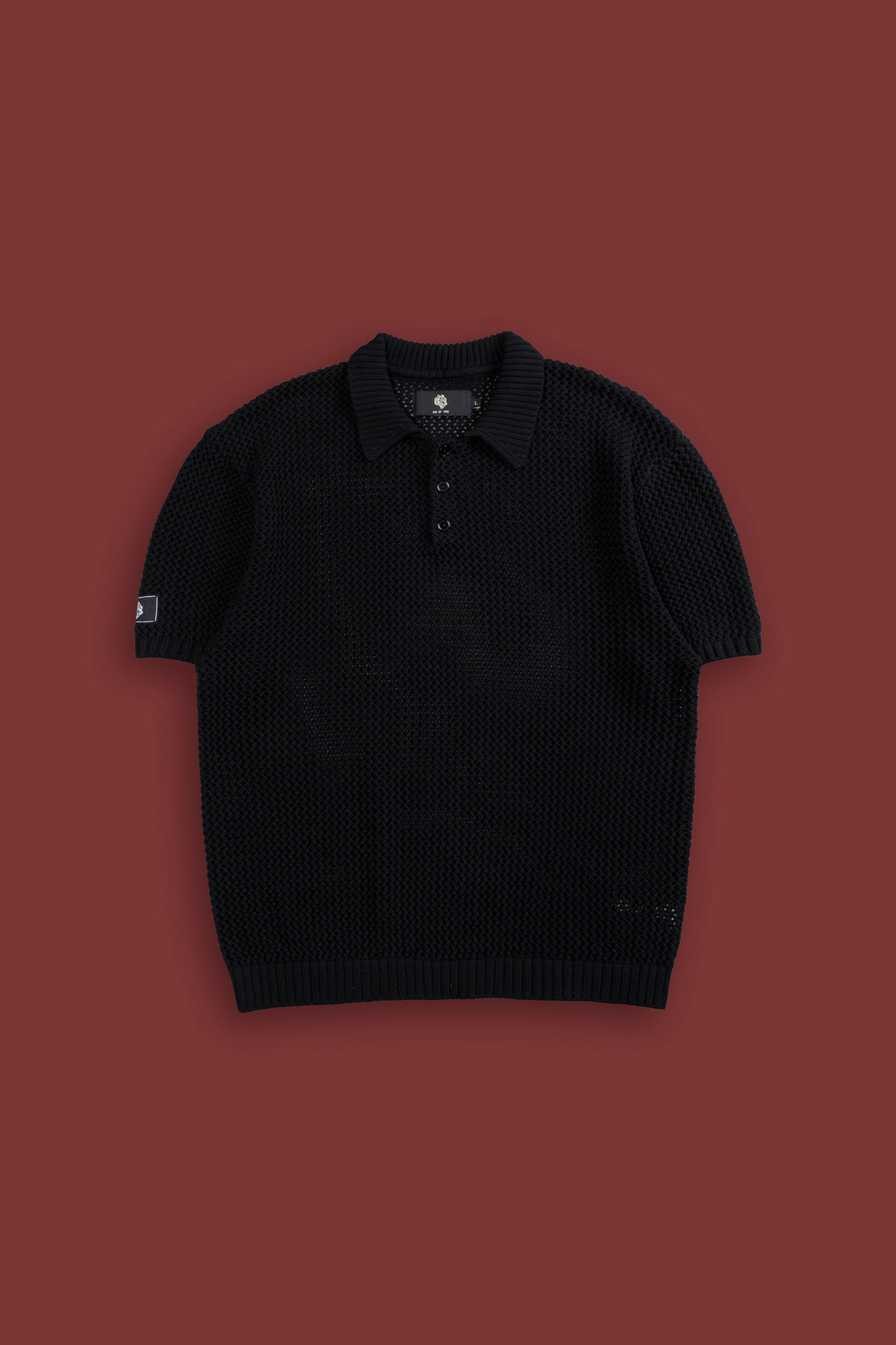 Wolf Patch Claude Knit Polo in Black