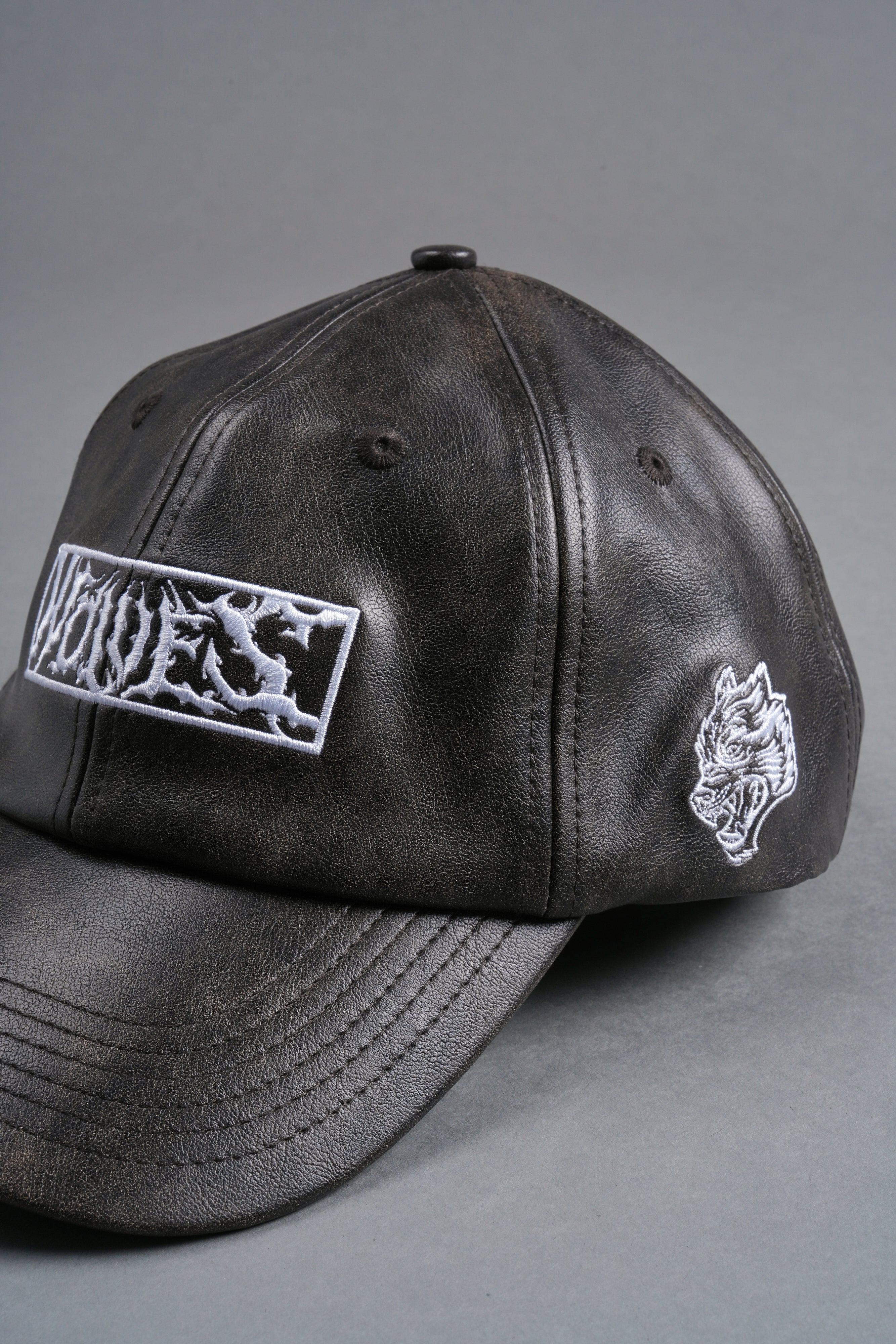 Midnight Wolves Faux Leather Dad Hat in Black