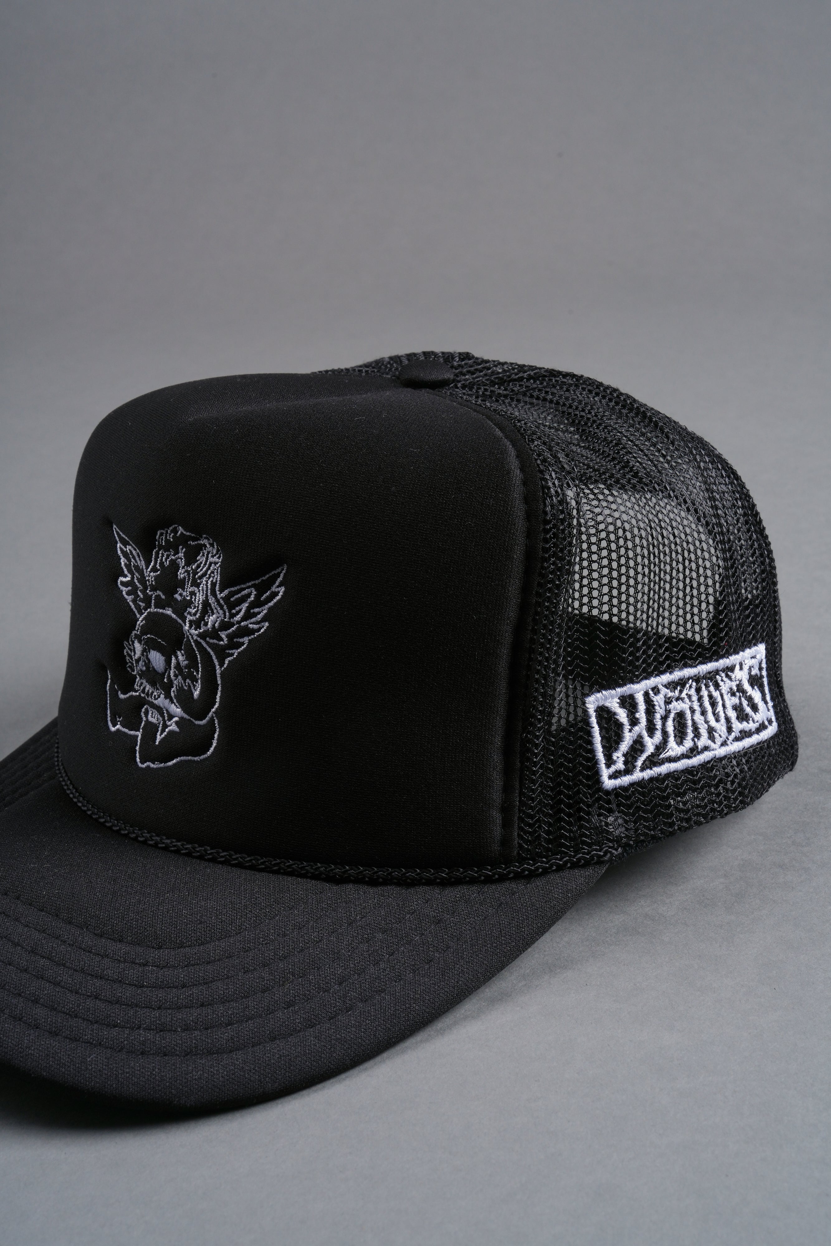 Cherub and the Skull Trucker Hat in Black
