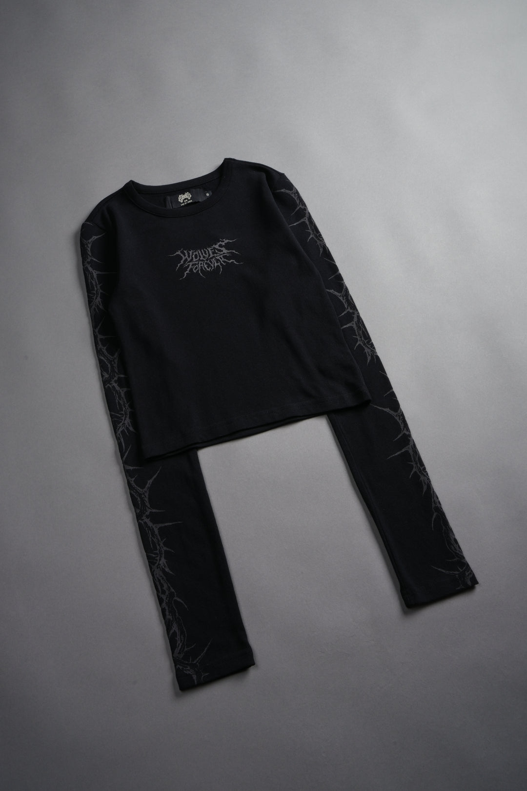 Surrounded by Thorns L/S "Baby" Tee in Black