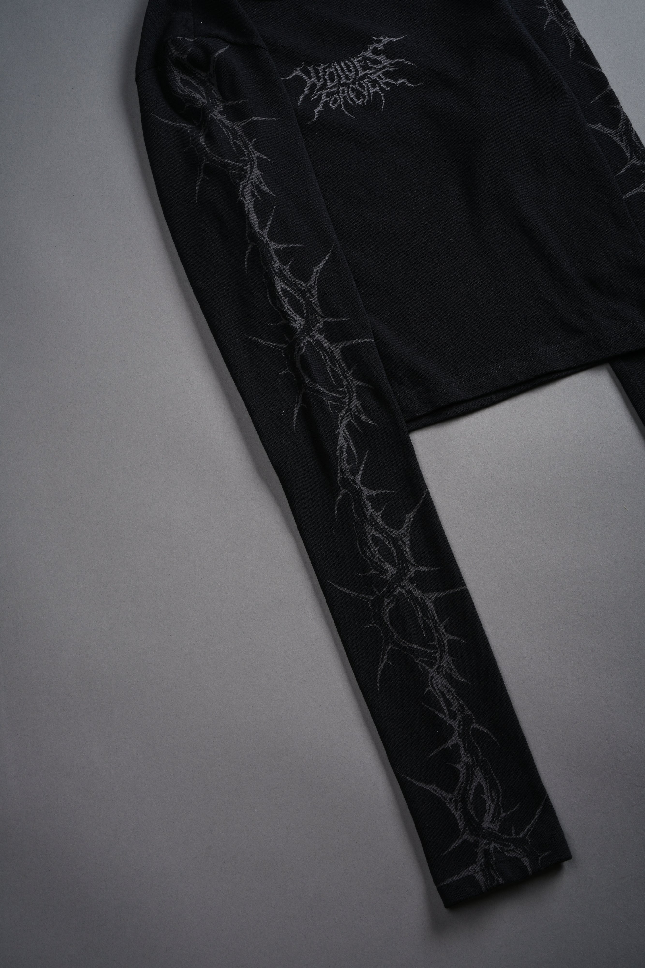 Surrounded by Thorns L/S "Baby" Tee in Black