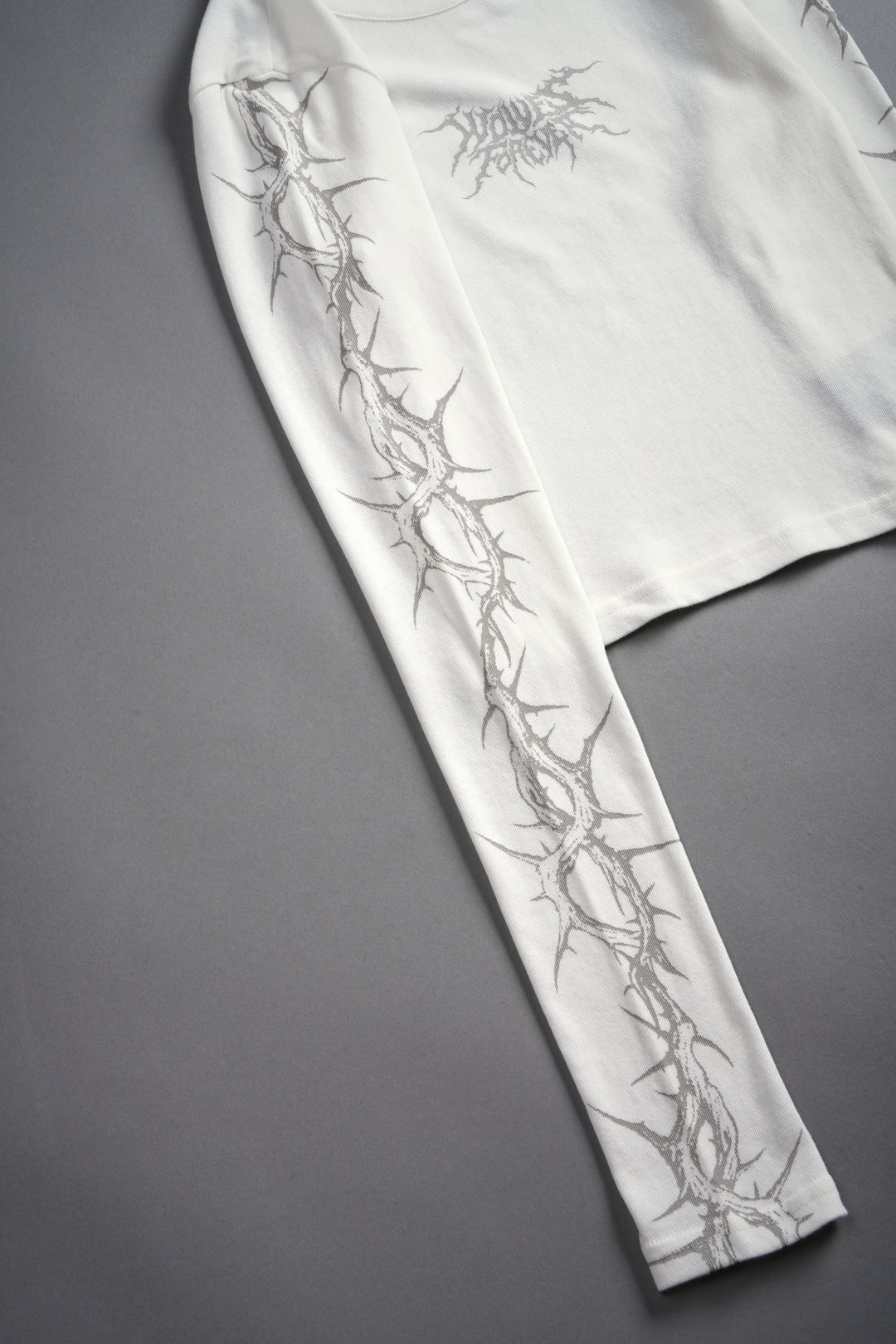 Surrounded by Thorns L/S "Baby" Tee in Cream