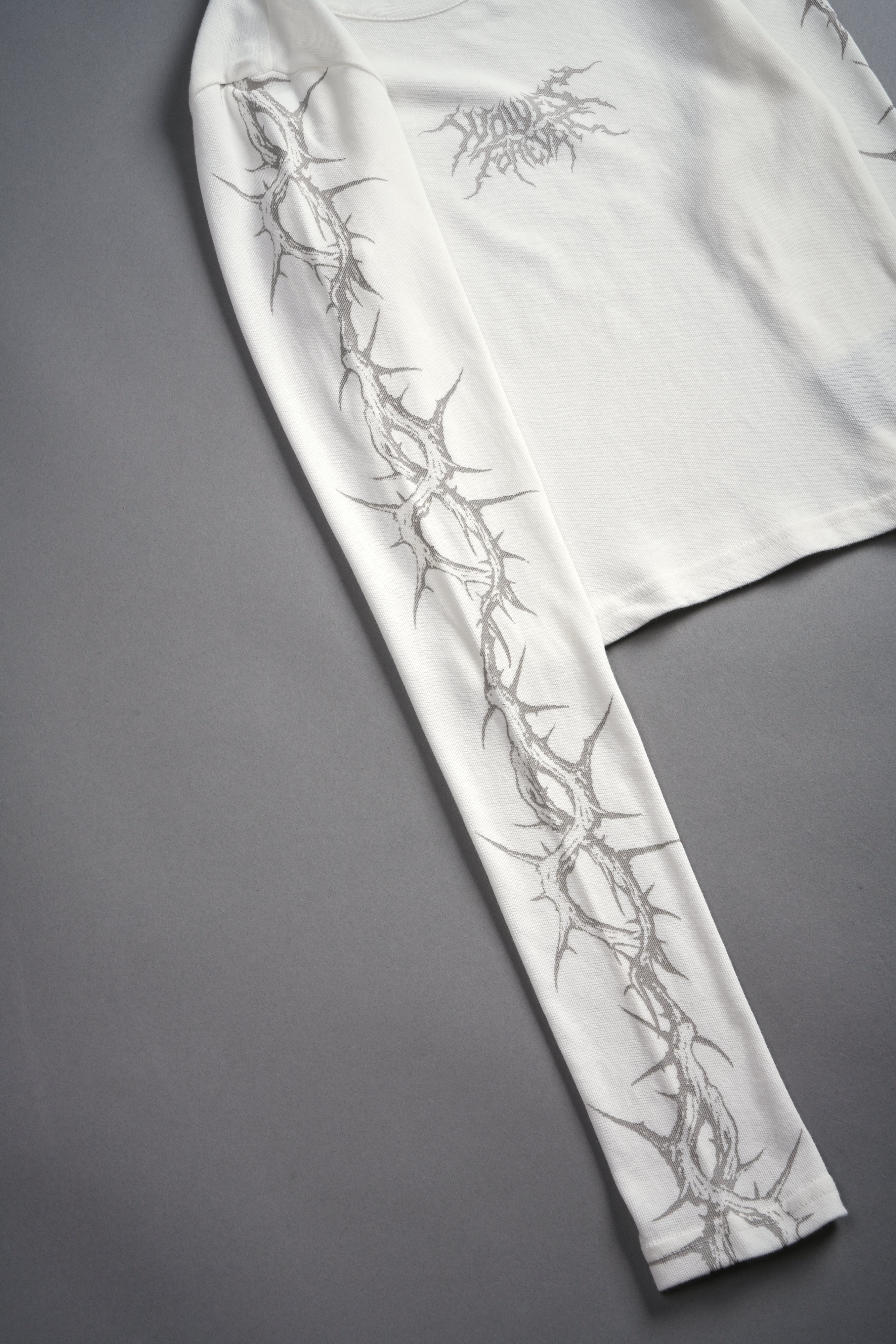 Surrounded by Thorns L/S "Baby" Tee in Cream