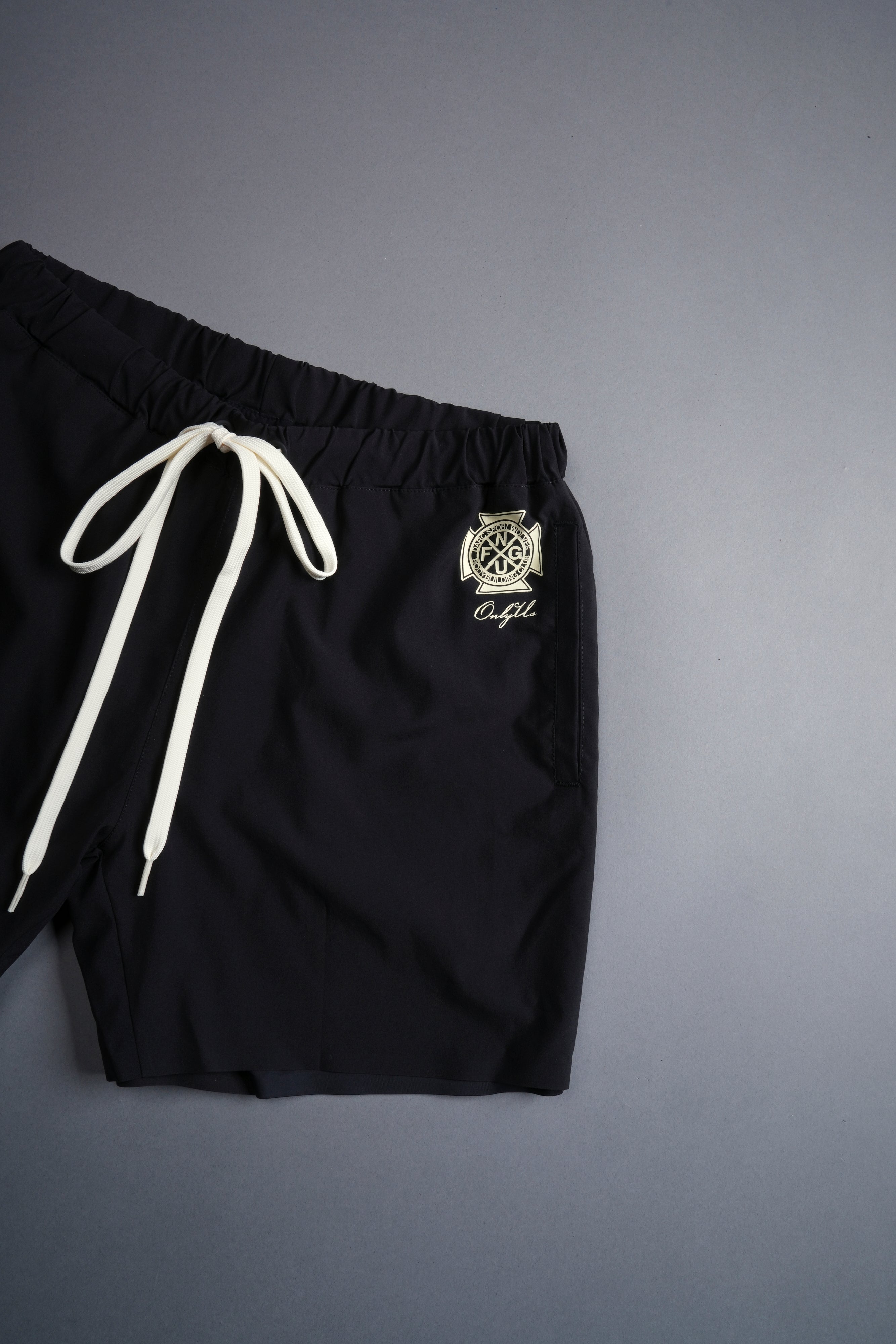 Darc Letter Compression Shorts in Black