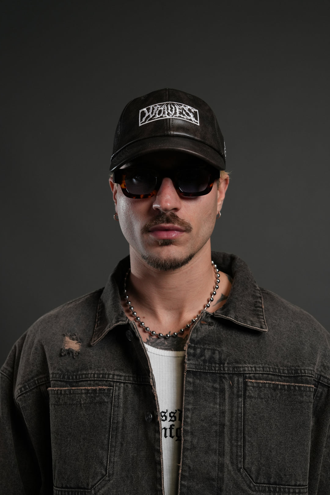 Midnight Wolves Faux Leather Dad Hat in Black