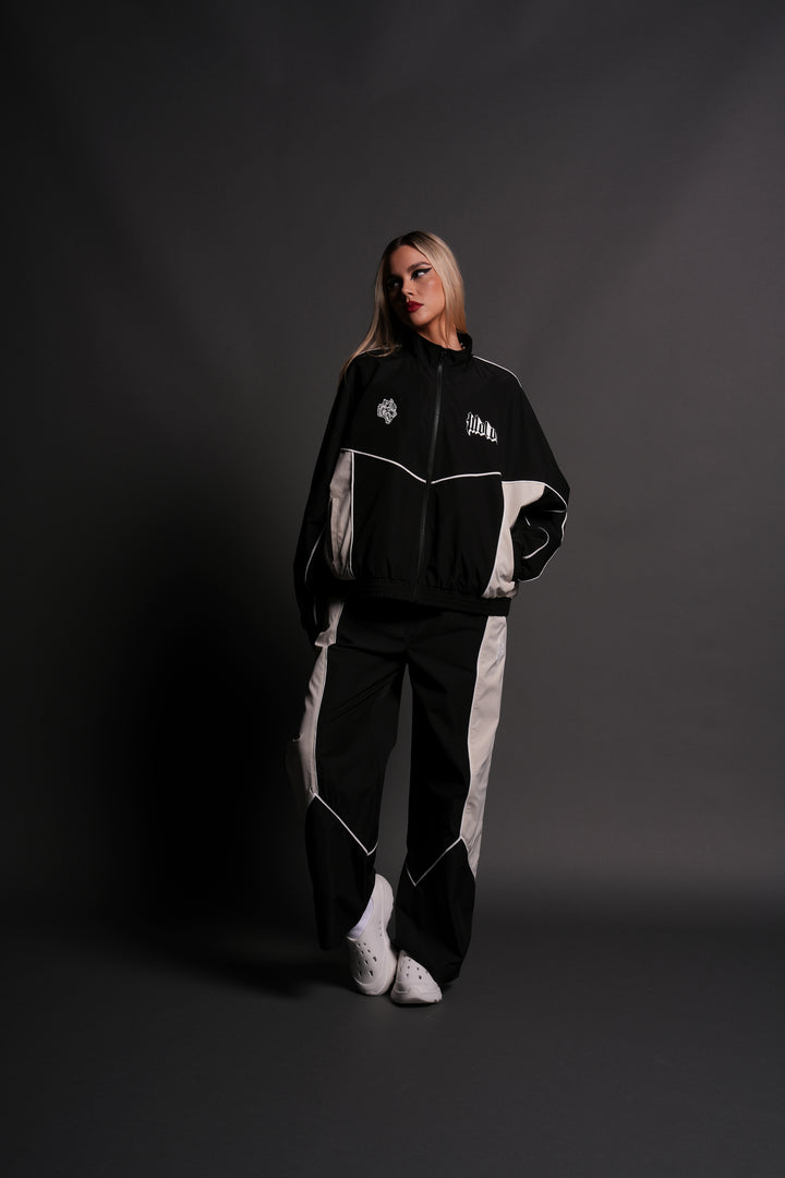 Our Passion Quinn Unisex Track Jacket in Black/Sand