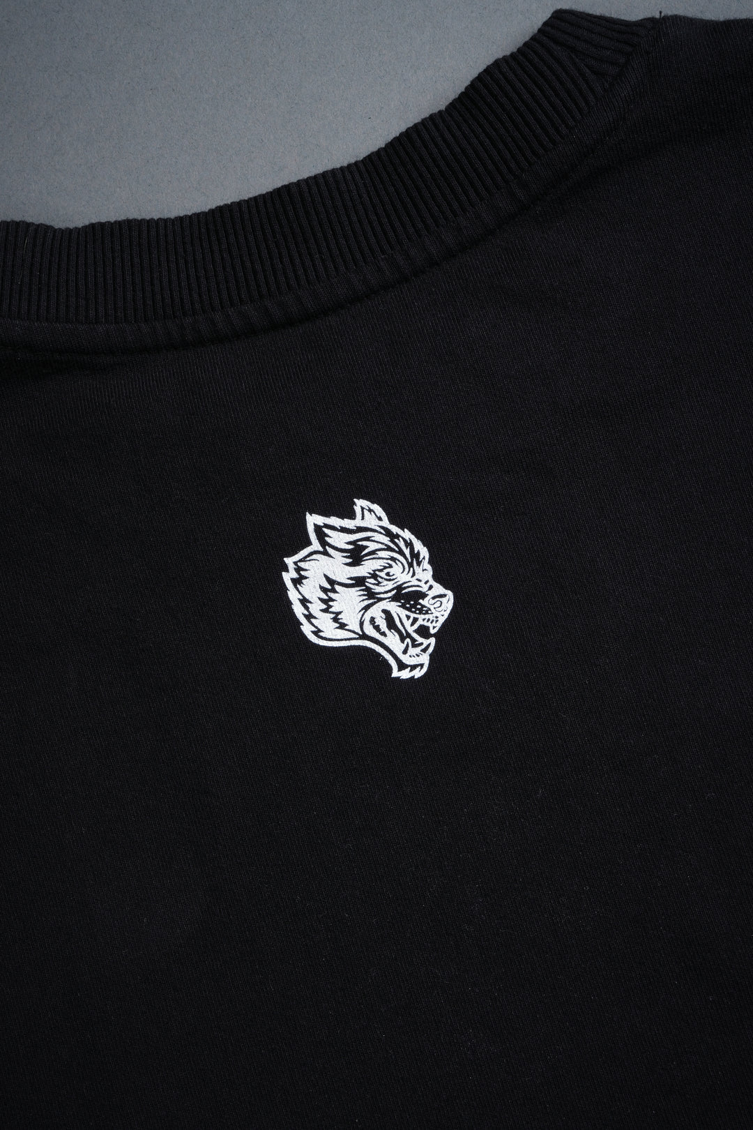 Awakened Power Grunge Mid Length Raw Hem Tee in Black