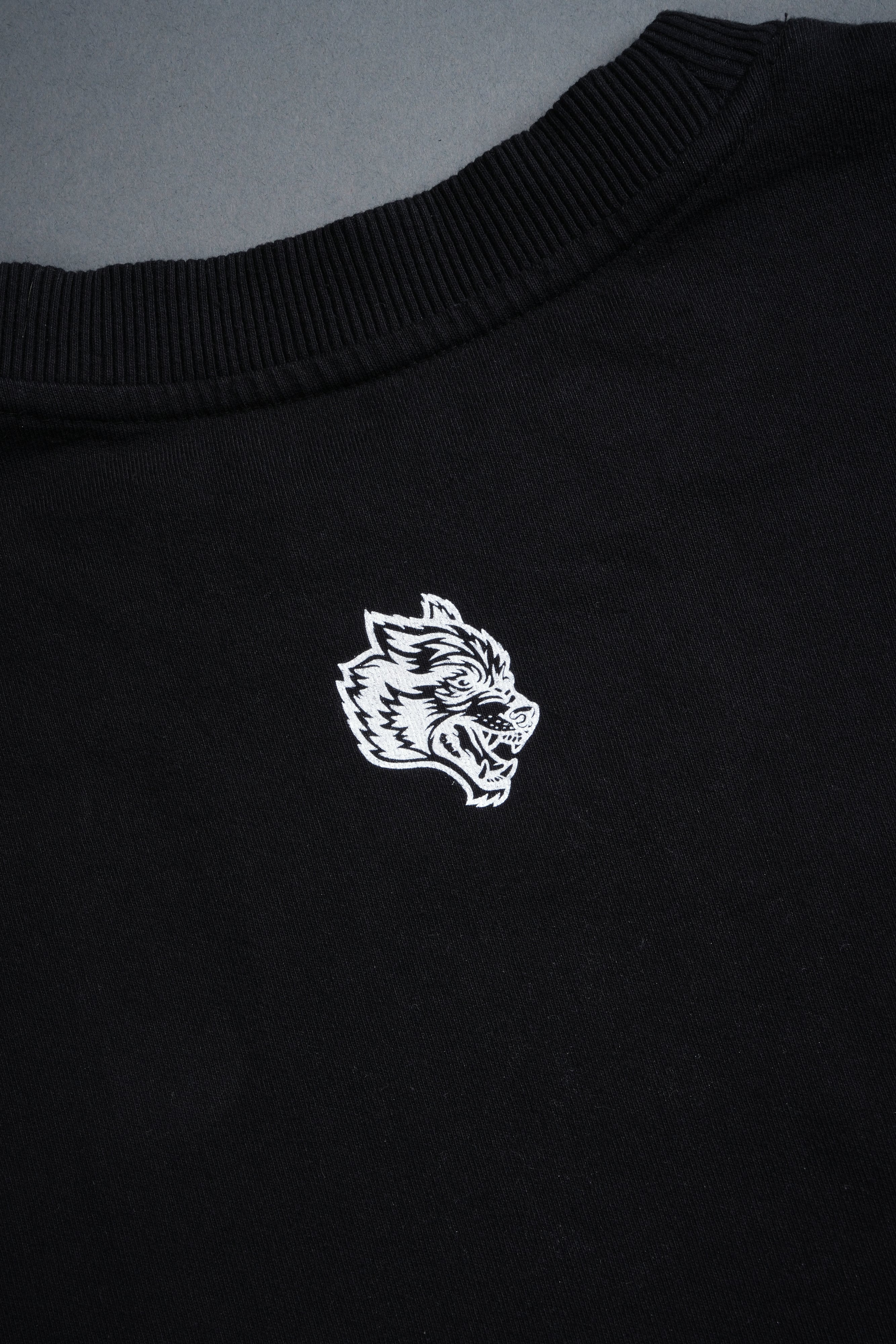 Awakened Power Grunge Mid Length Raw Hem Tee in Black