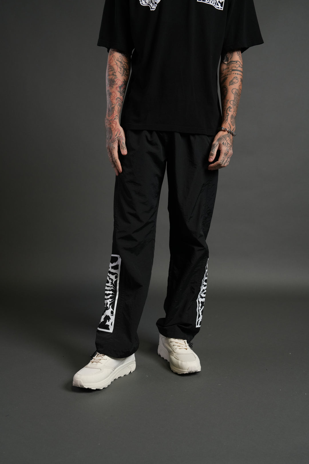 Midnight Wolves Remind Track Pants in Black/Black