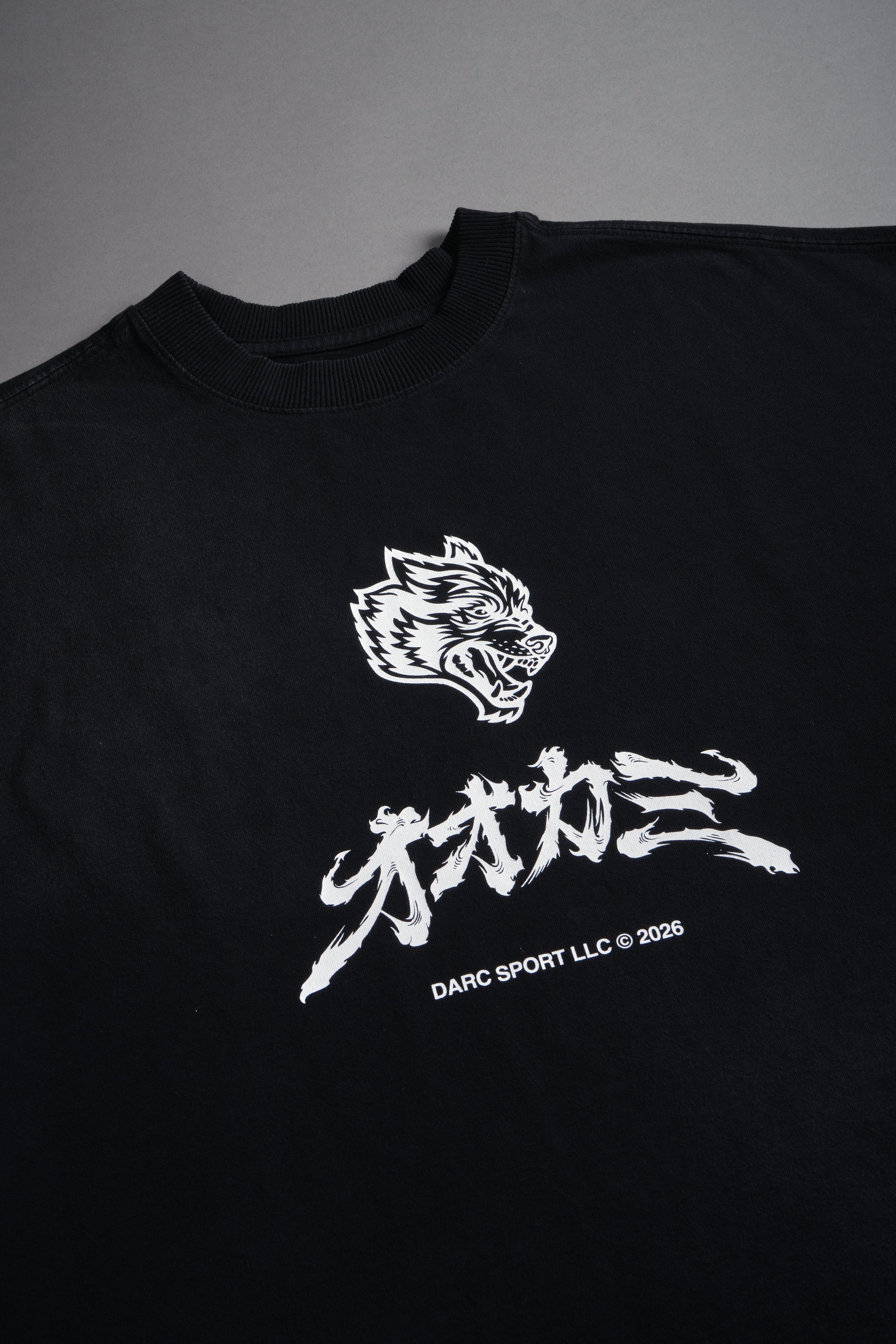 Okami Bushido Grunge Cut-Off Mid Length Raw Hem Tee in Black Sun Fade