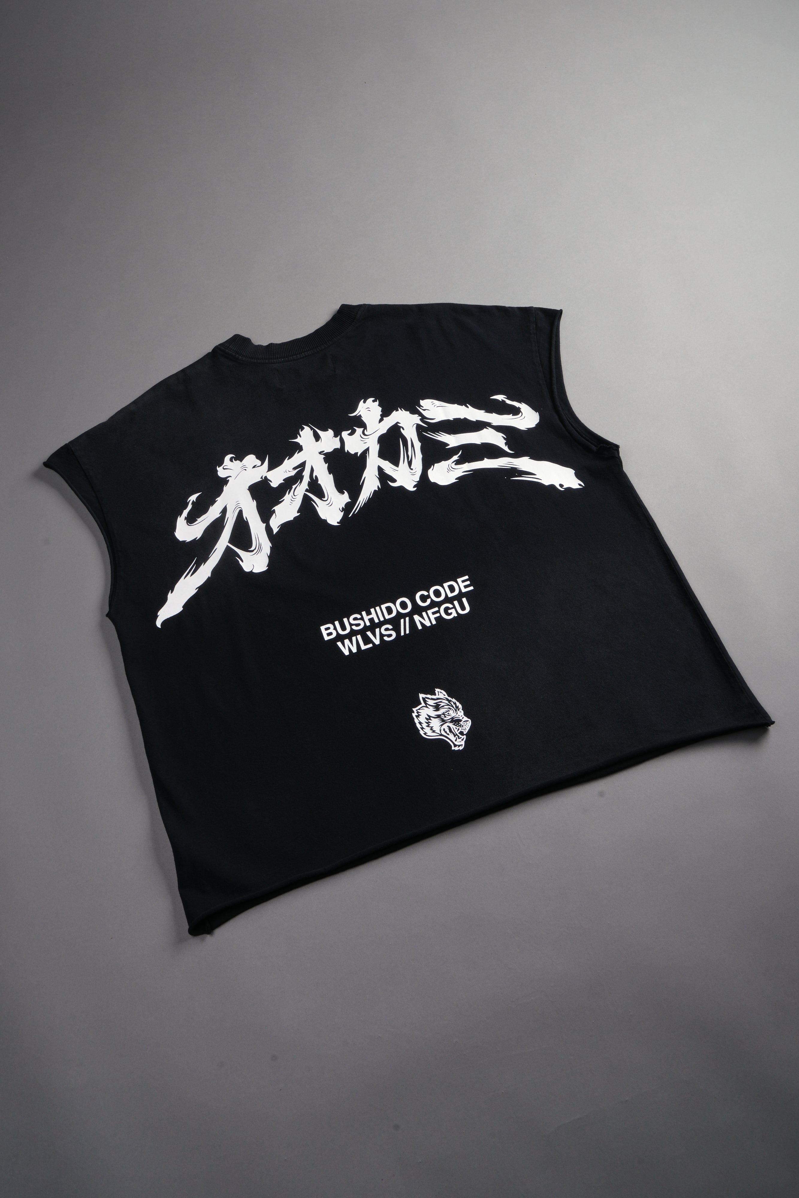 Okami Bushido Grunge Cut-Off Mid Length Raw Hem Tee in Black Sun Fade