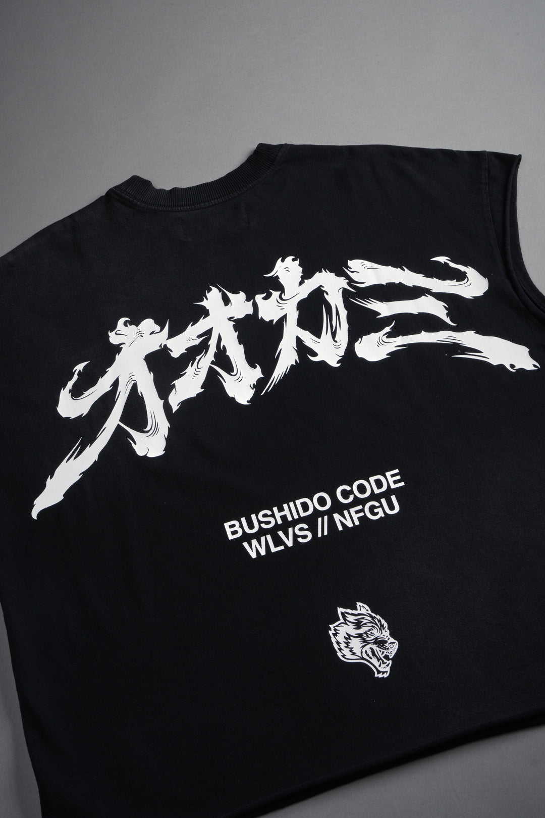 Okami Bushido Grunge Cut-Off Mid Length Raw Hem Tee in Black Sun Fade