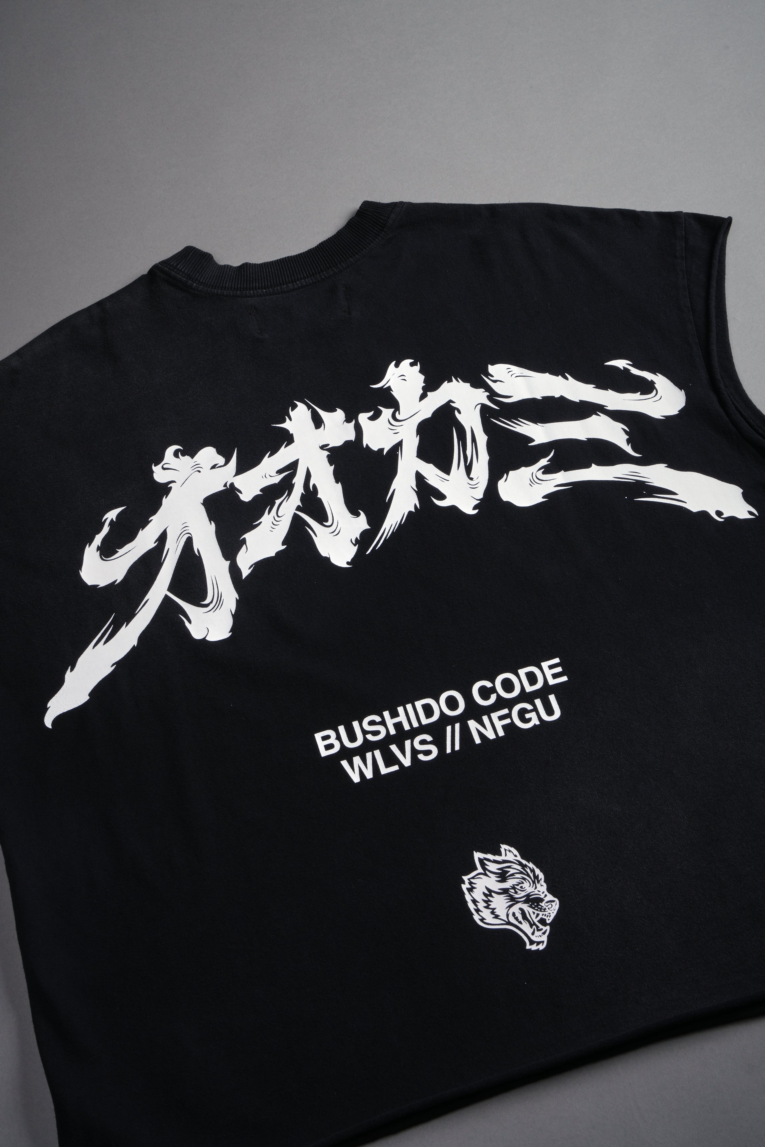 Okami Bushido Grunge Cut-Off Mid Length Raw Hem Tee in Black Sun Fade