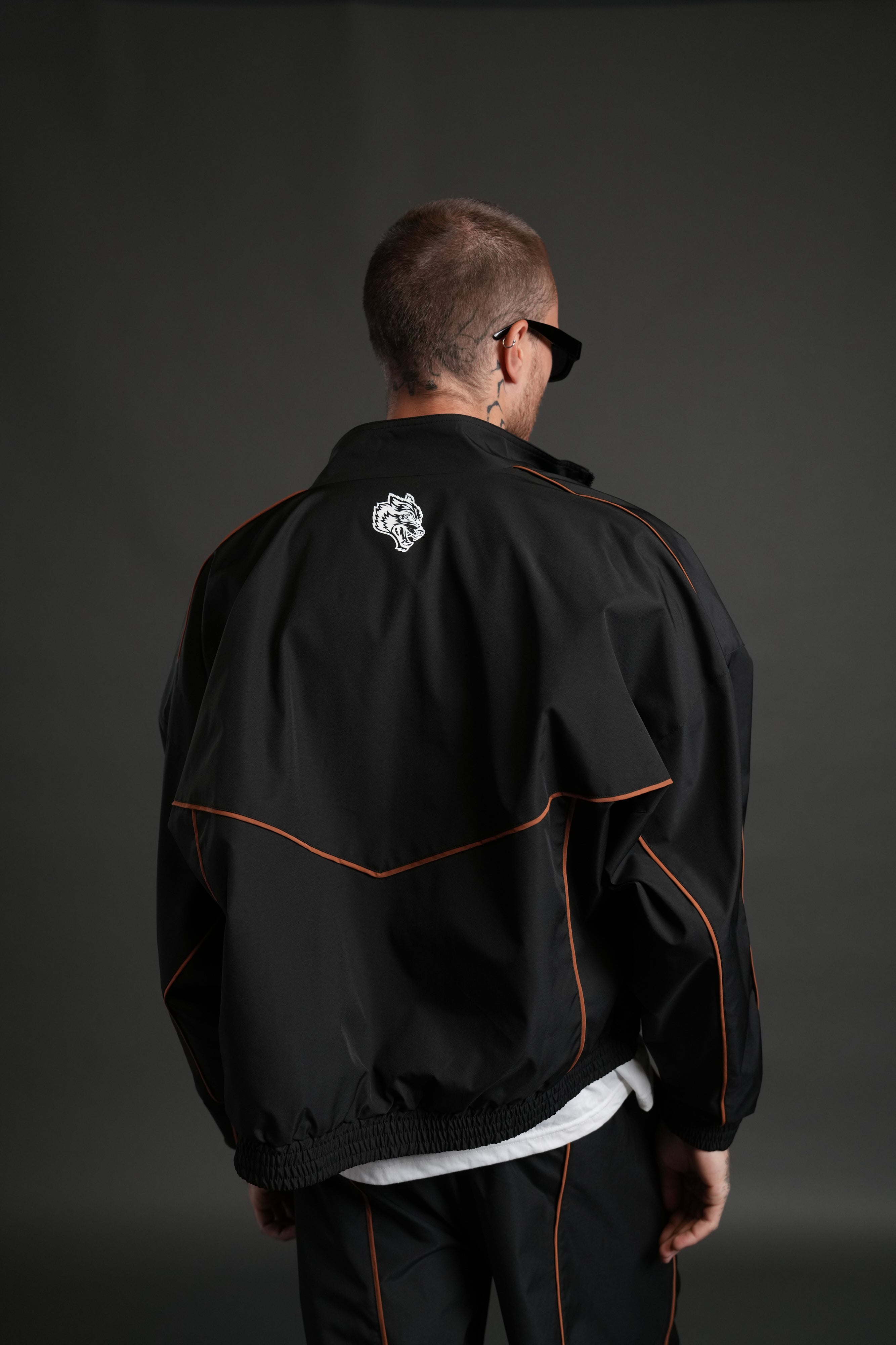 Wolves Quinn Unisex Track Jacket in Black/Desert