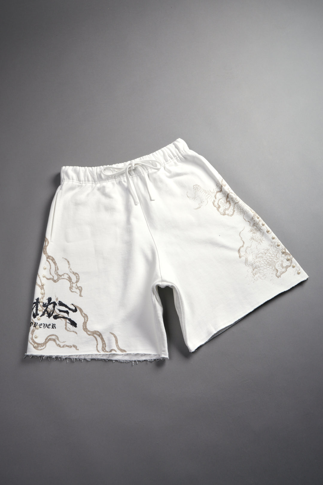 Kokuryu Grunge Oversized Raw Hem Post Lounge Sweat Shorts in Cream