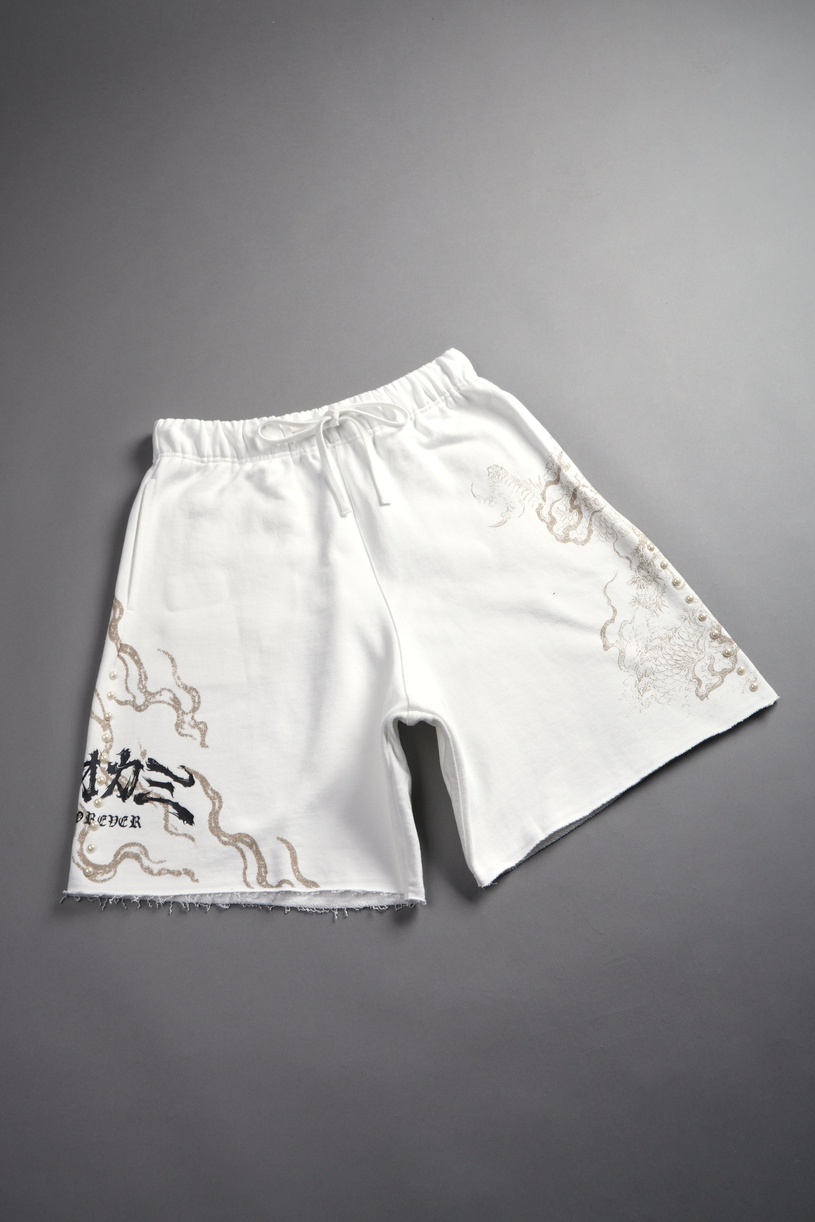 Kokuryu Grunge Oversized Raw Hem Post Lounge Sweat Shorts in Cream