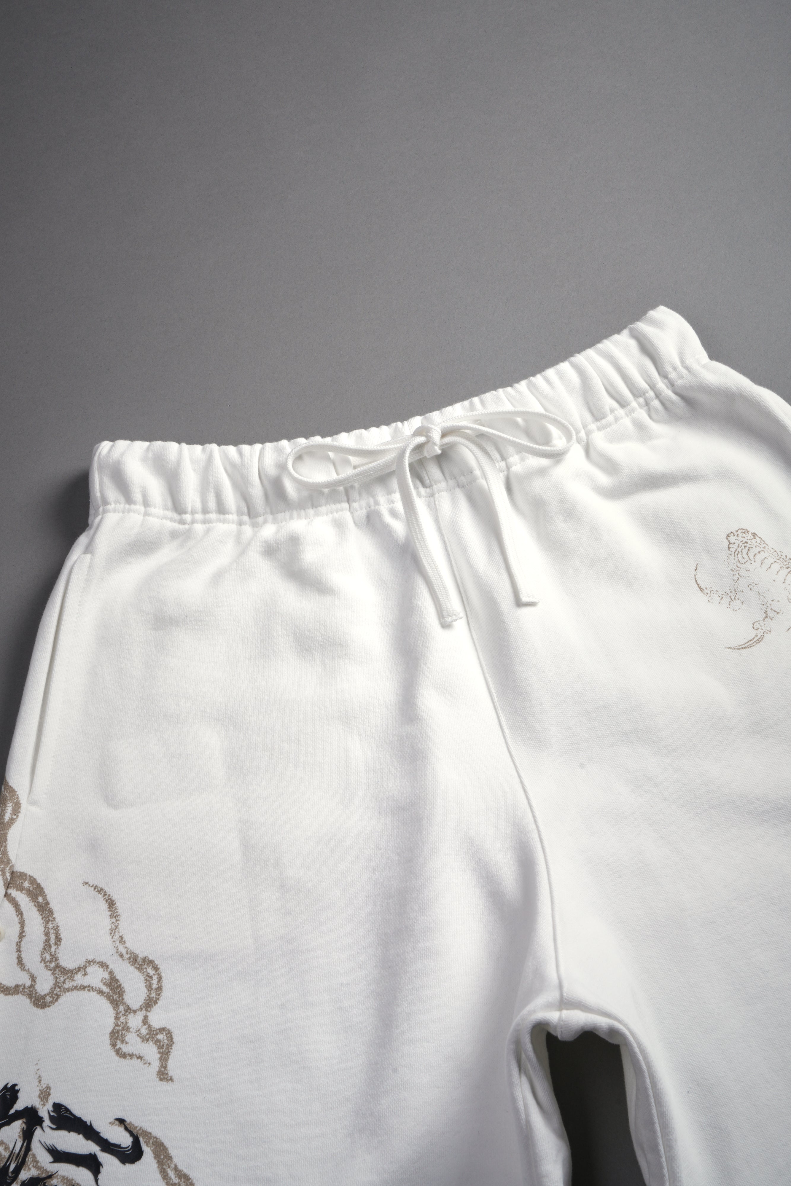 Kokuryu Grunge Oversized Raw Hem Post Lounge Sweat Shorts in Cream
