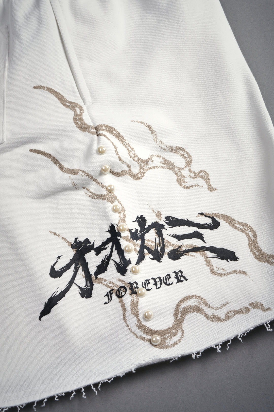 Kokuryu Grunge Oversized Raw Hem Post Lounge Sweat Shorts in Cream