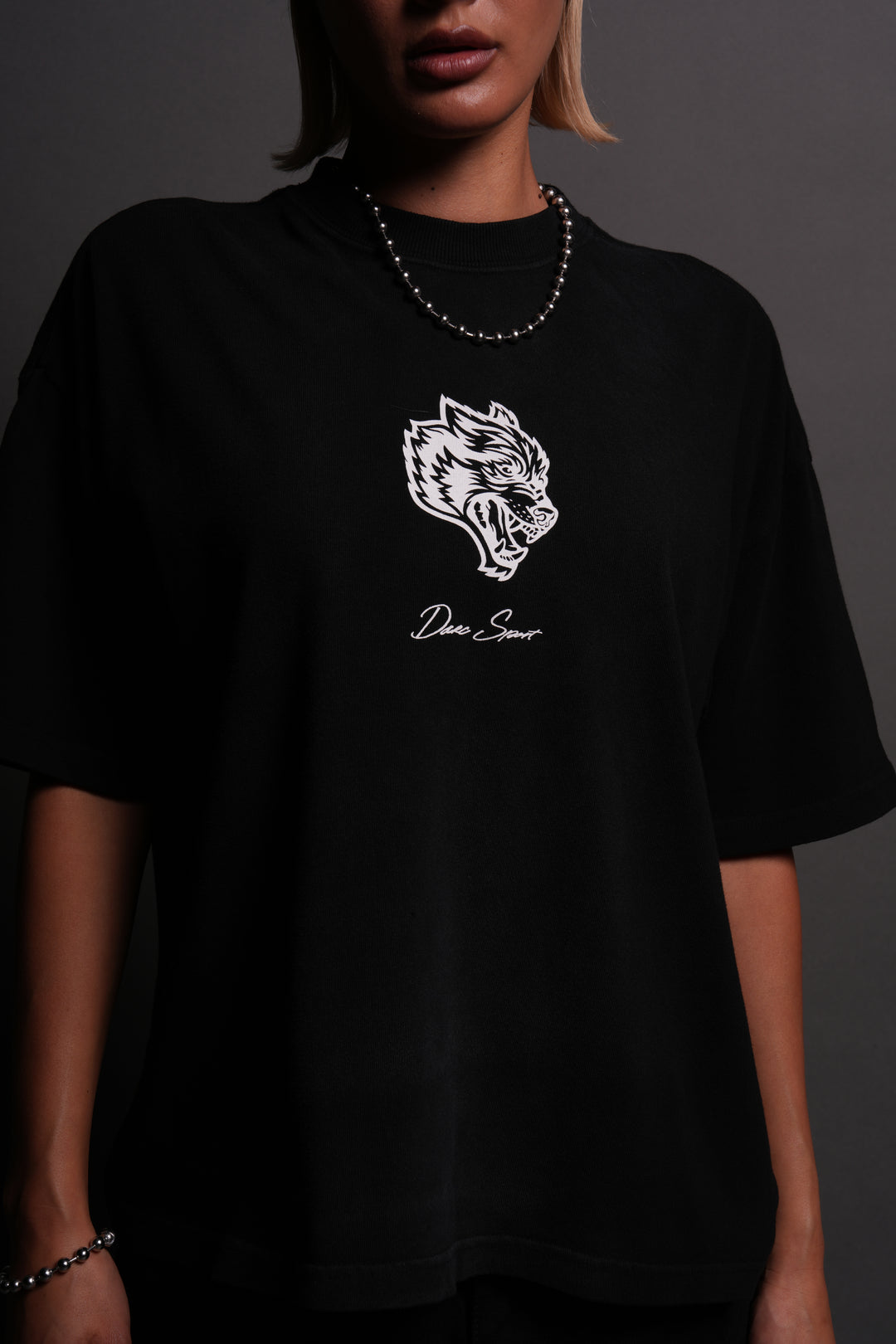 Our Wolf Forever Box Cut "Pump Cover" Tee in Black Spine Sun Fade