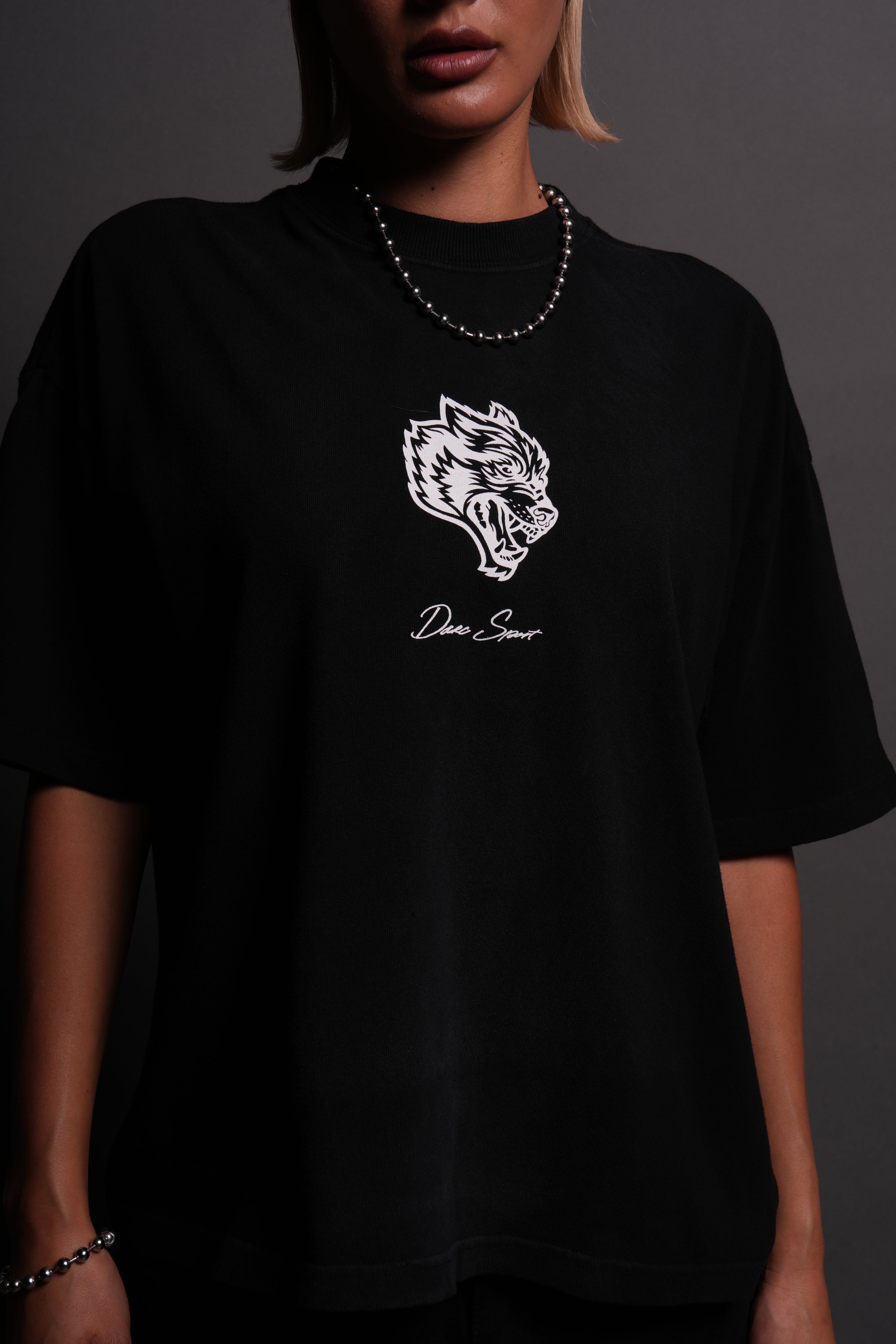 Our Wolf Forever Box Cut "Pump Cover" Tee in Black Spine Sun Fade