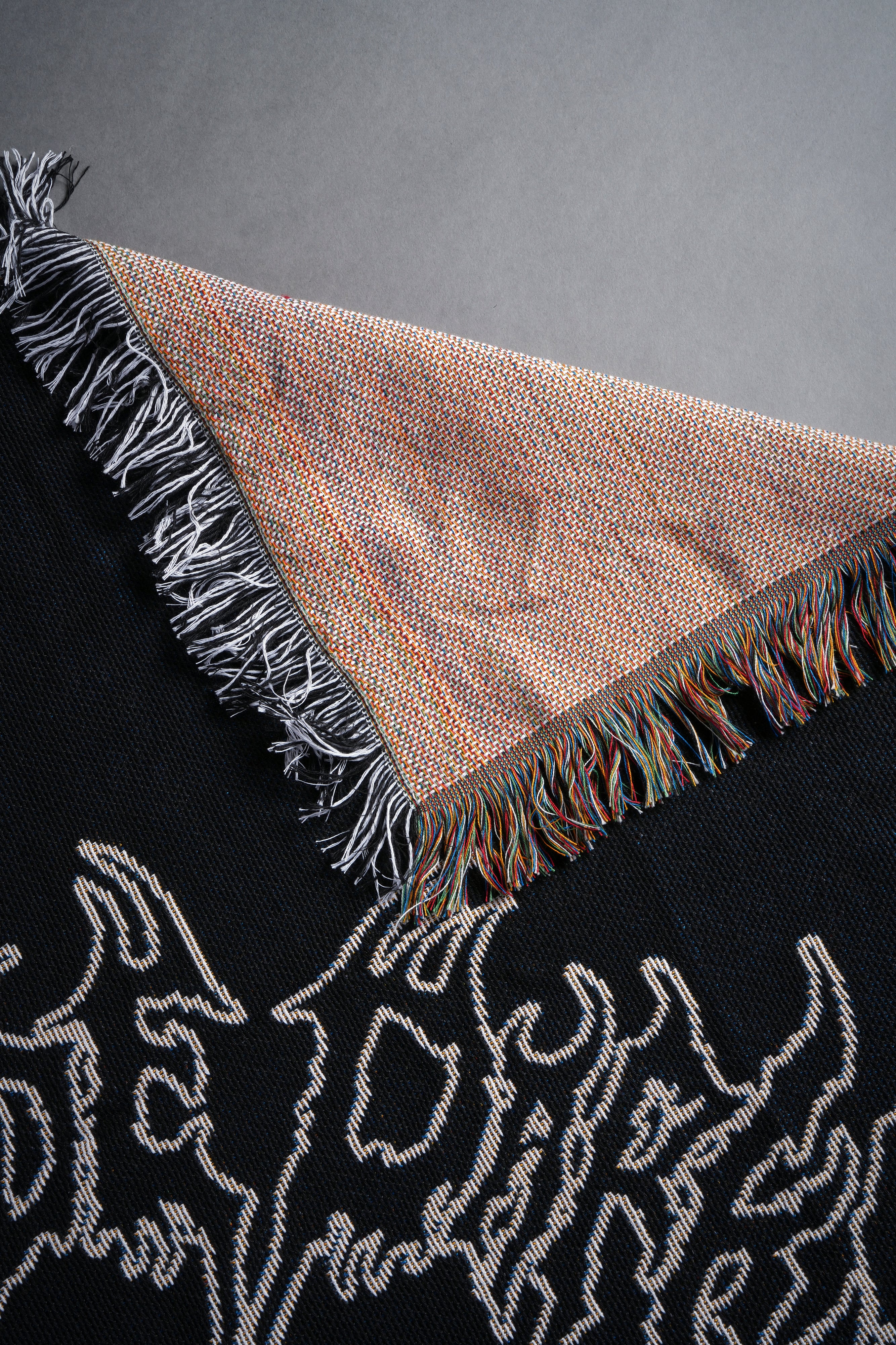 Rise To Darkness Tapestry Blanket in Black