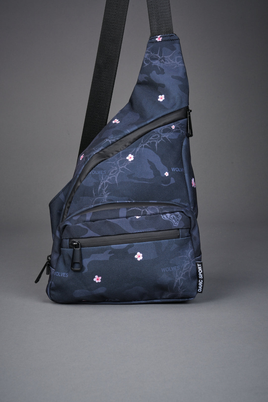 Darc Sport Wolves Blossom Sling Bag in Warrior in a Garden Black Camo