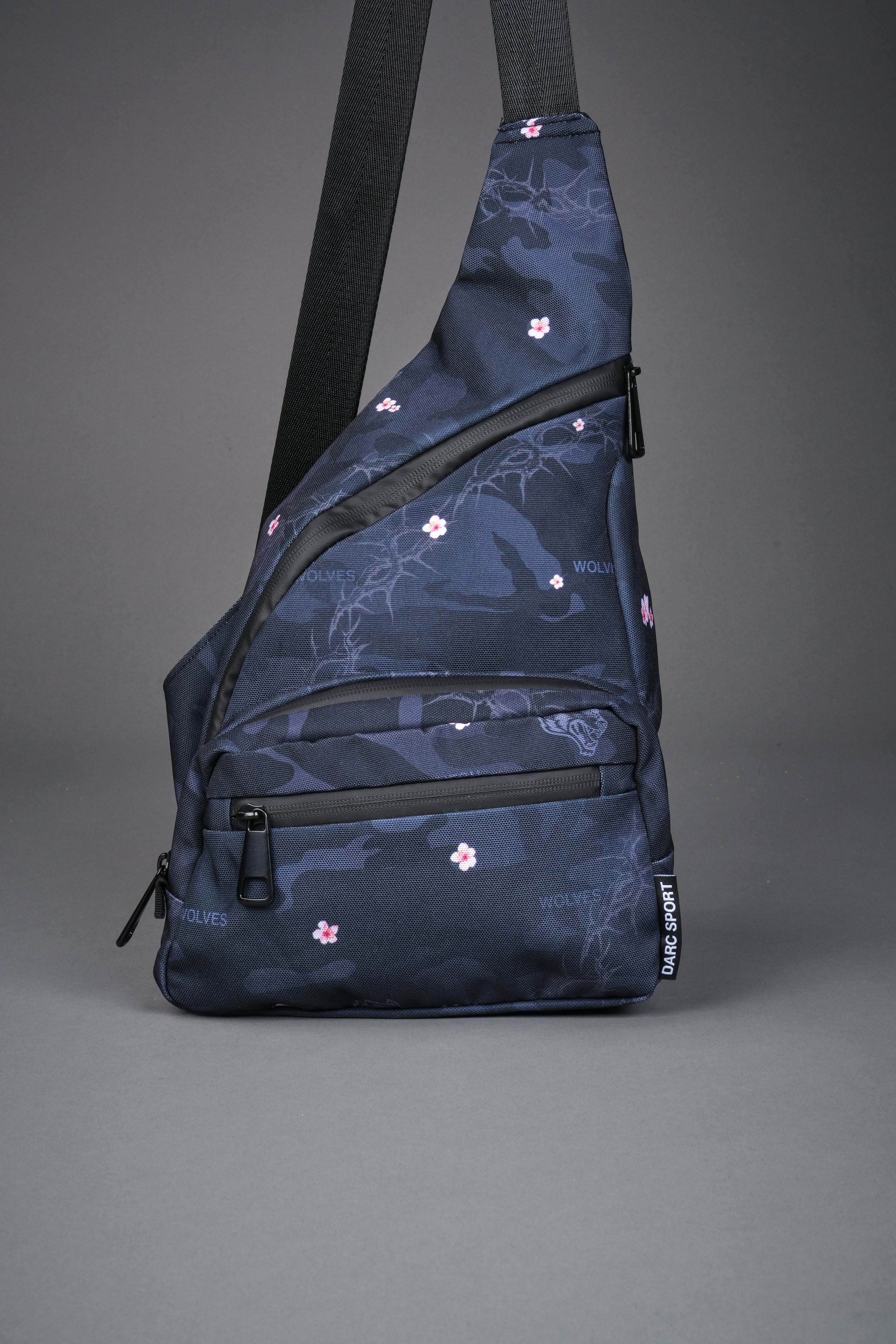 Darc Sport Wolves Blossom Sling Bag in Warrior in a Garden Black Camo
