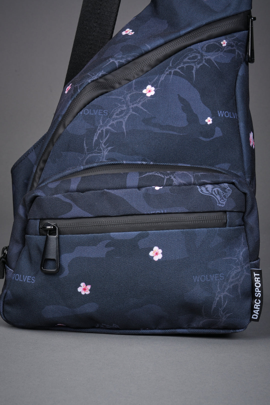 Darc Sport Wolves Blossom Sling Bag in Warrior in a Garden Black Camo
