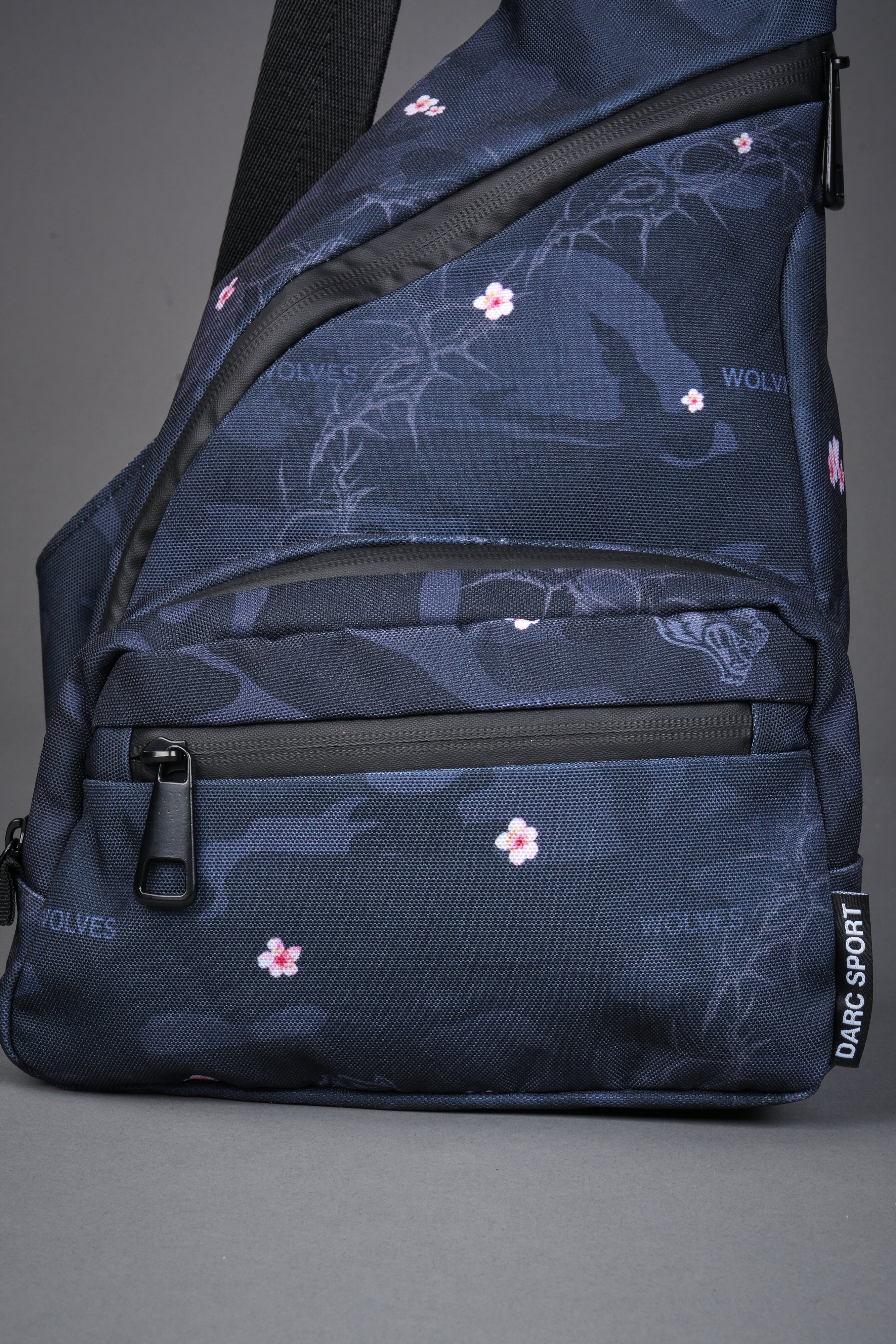 Darc Sport Wolves Blossom Sling Bag in Warrior in a Garden Black Camo