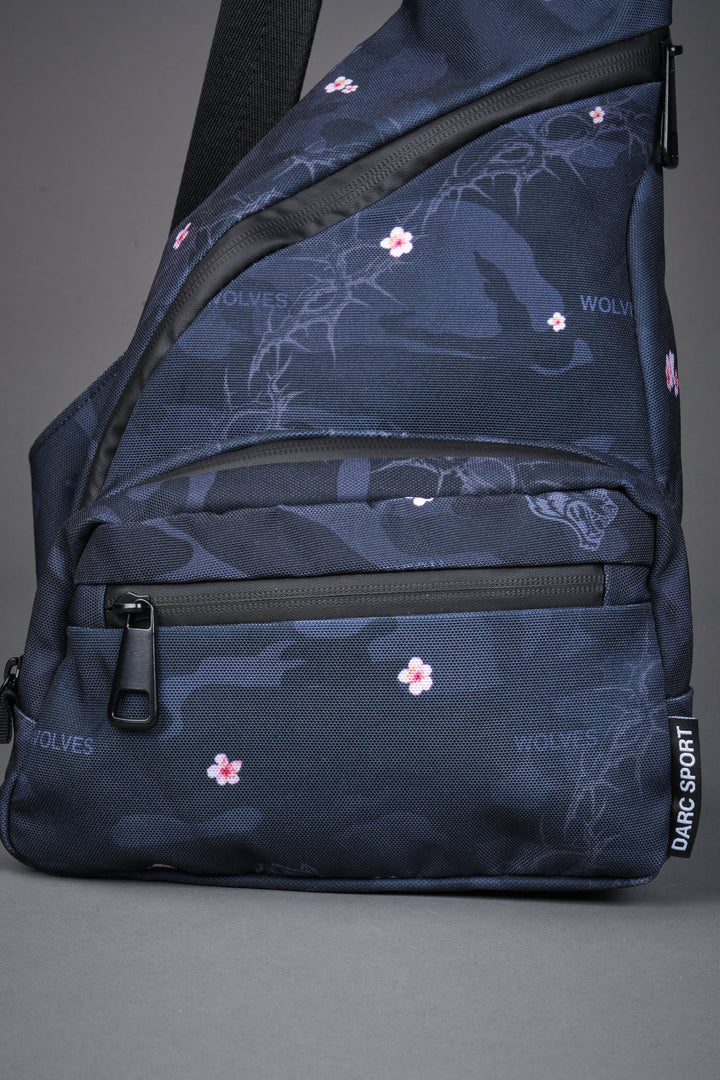 Darc Sport Wolves Blossom Sling Bag in Warrior in a Garden Black Camo
