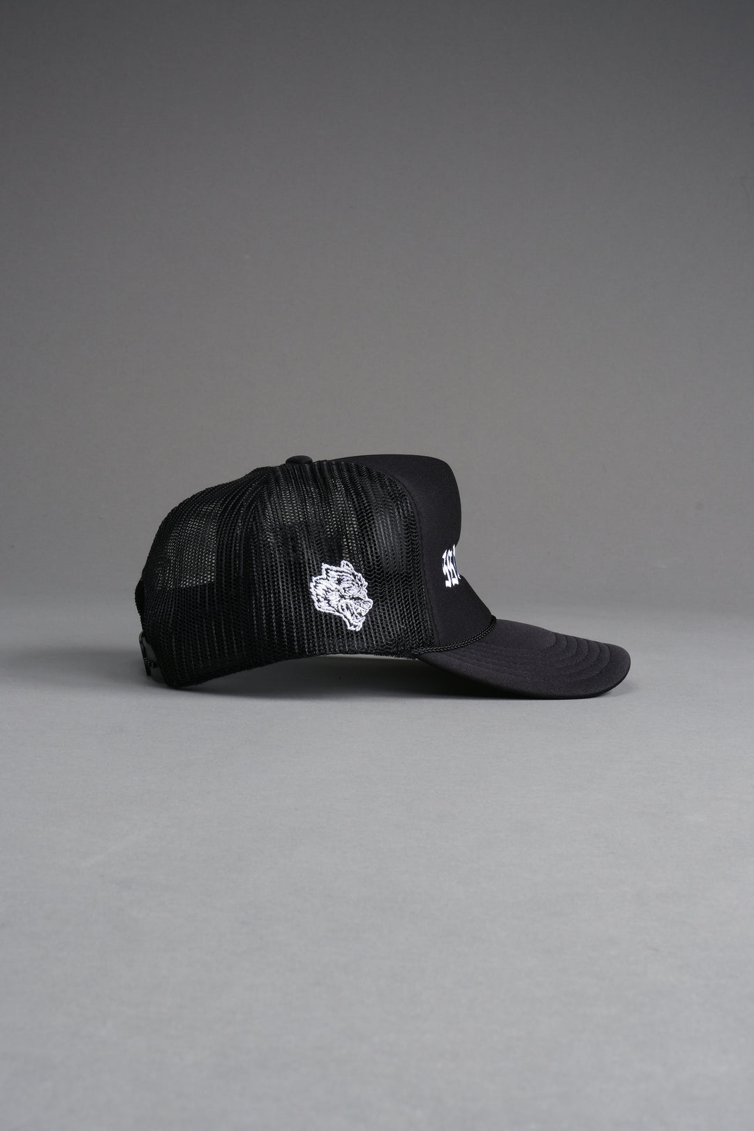 Our Mantra Trucker Hat in Black