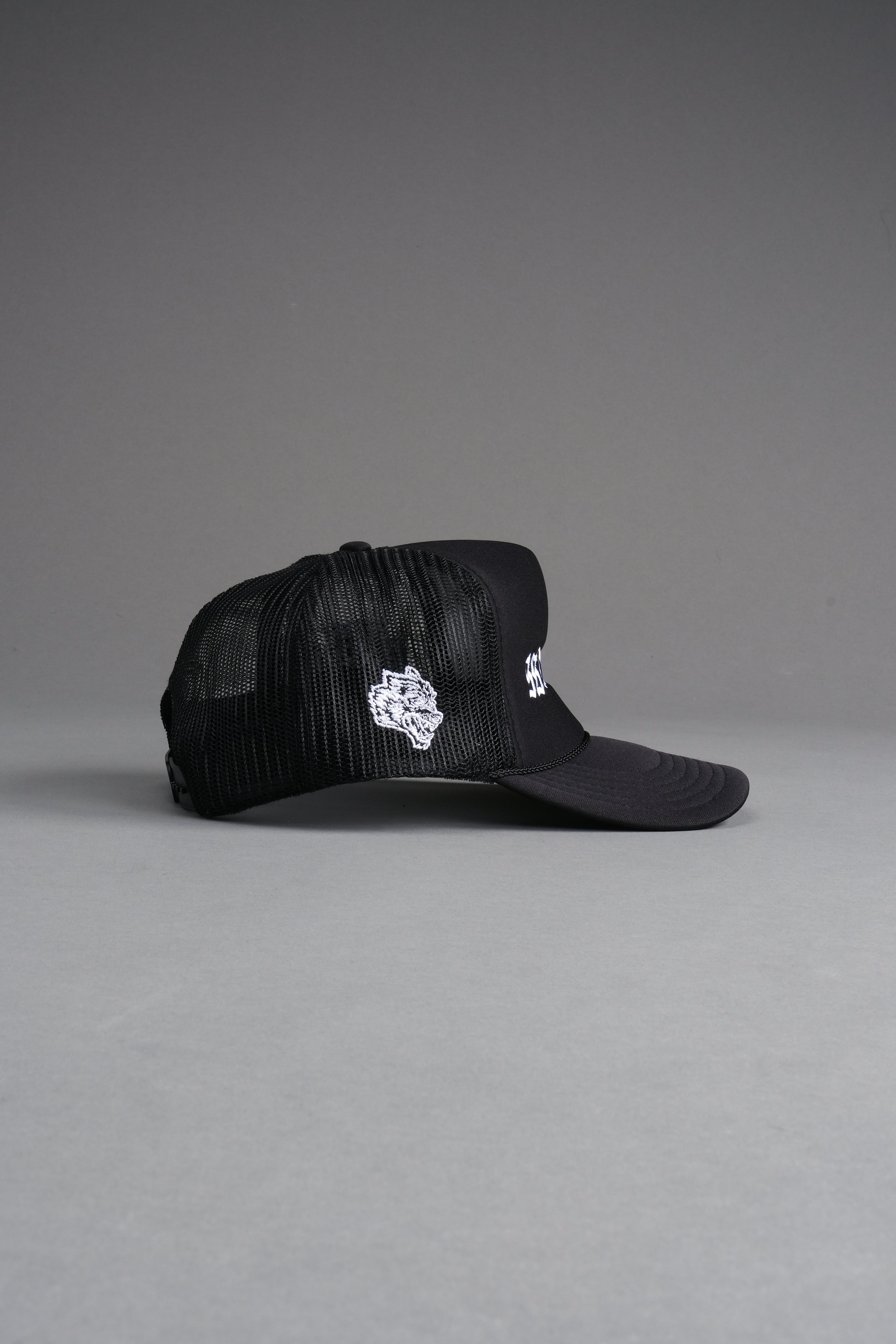 Our Mantra Trucker Hat in Black